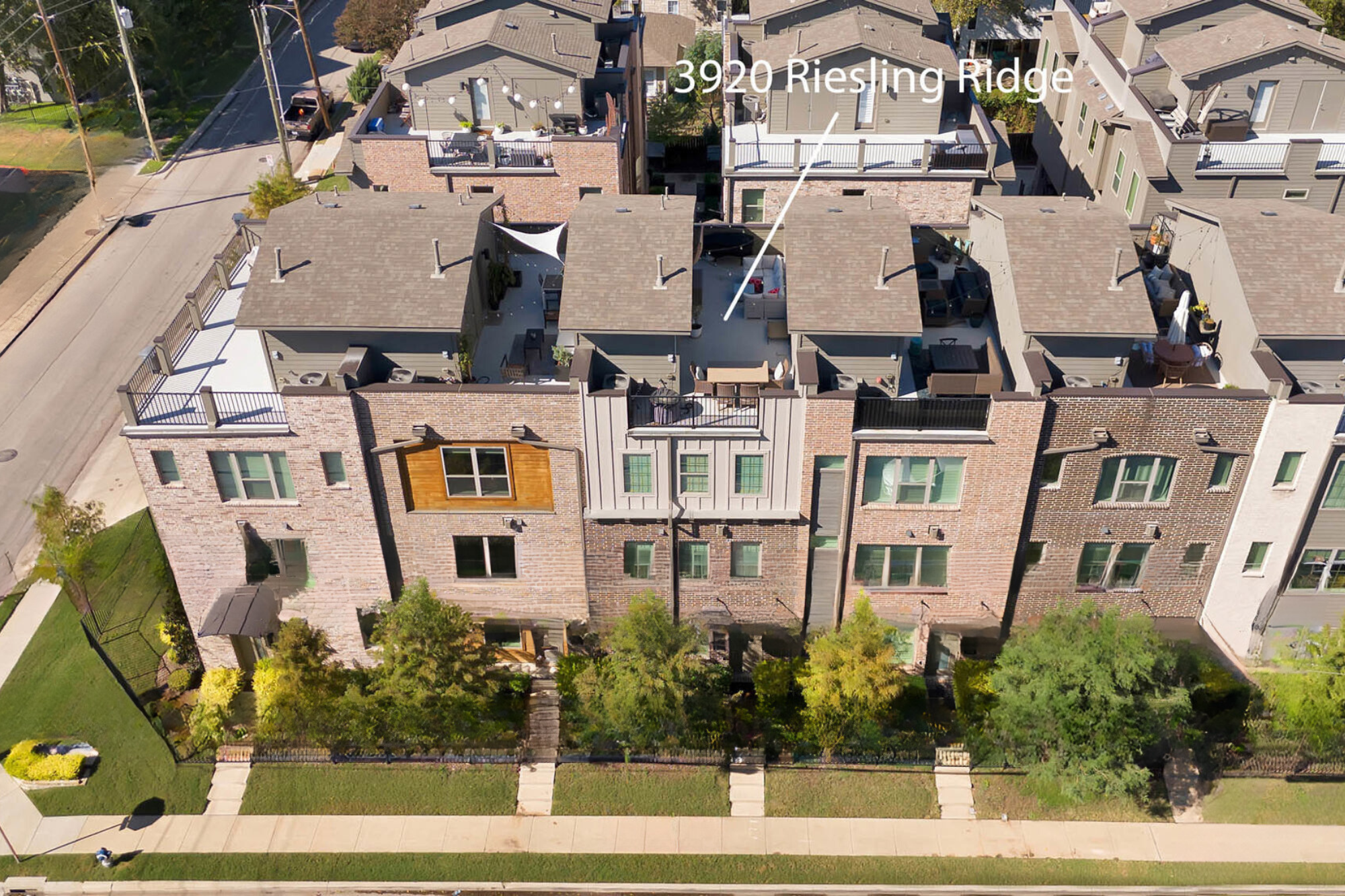 3920 Riesling Ridge Dallas, TX 75204 - Photo 24 of 26 an aerial view of residential houses with outdoor space and parking