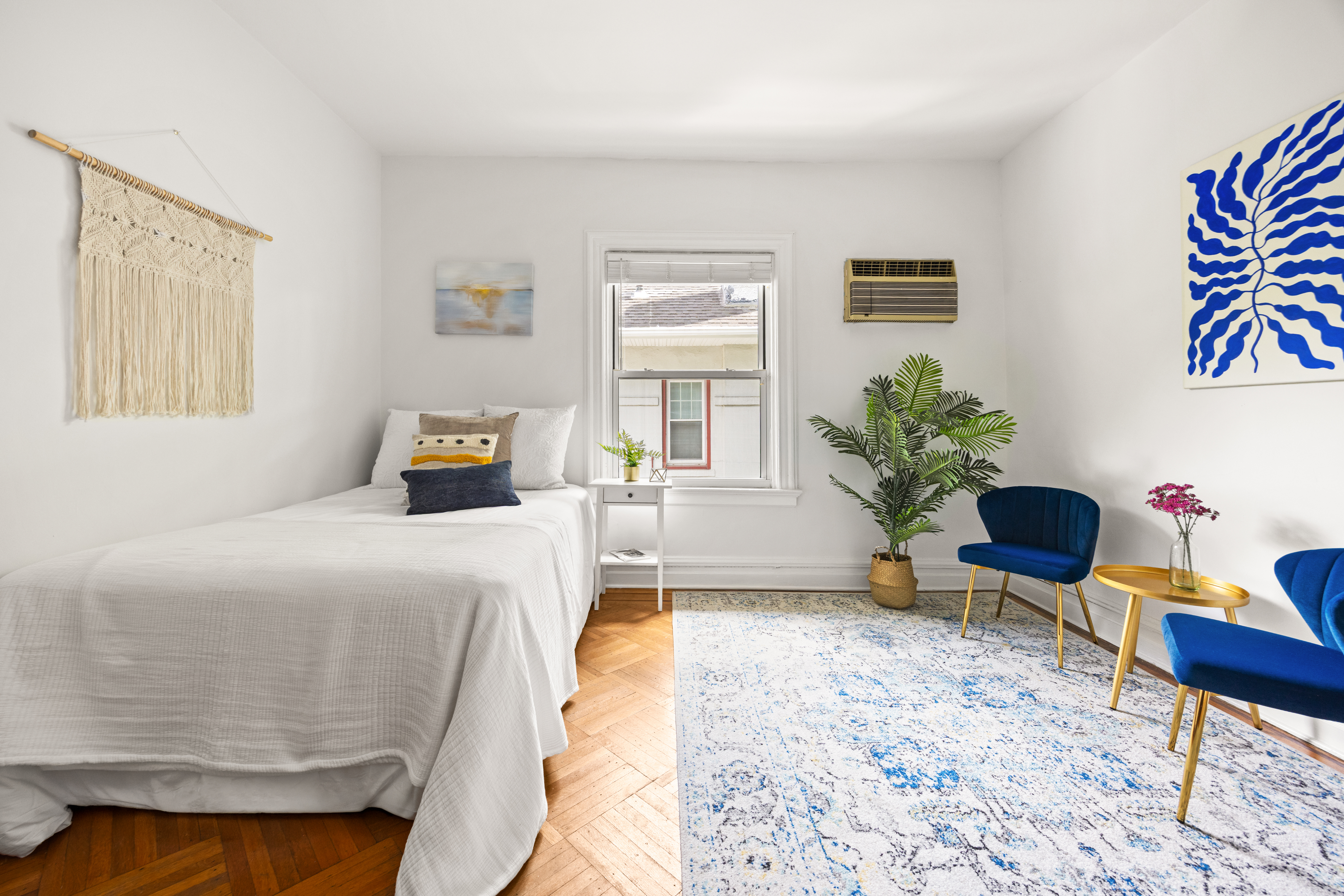 481 Stratford Road Brooklyn, NY 11218 - Photo 13 of 25 a bedroom with a bed and a chair