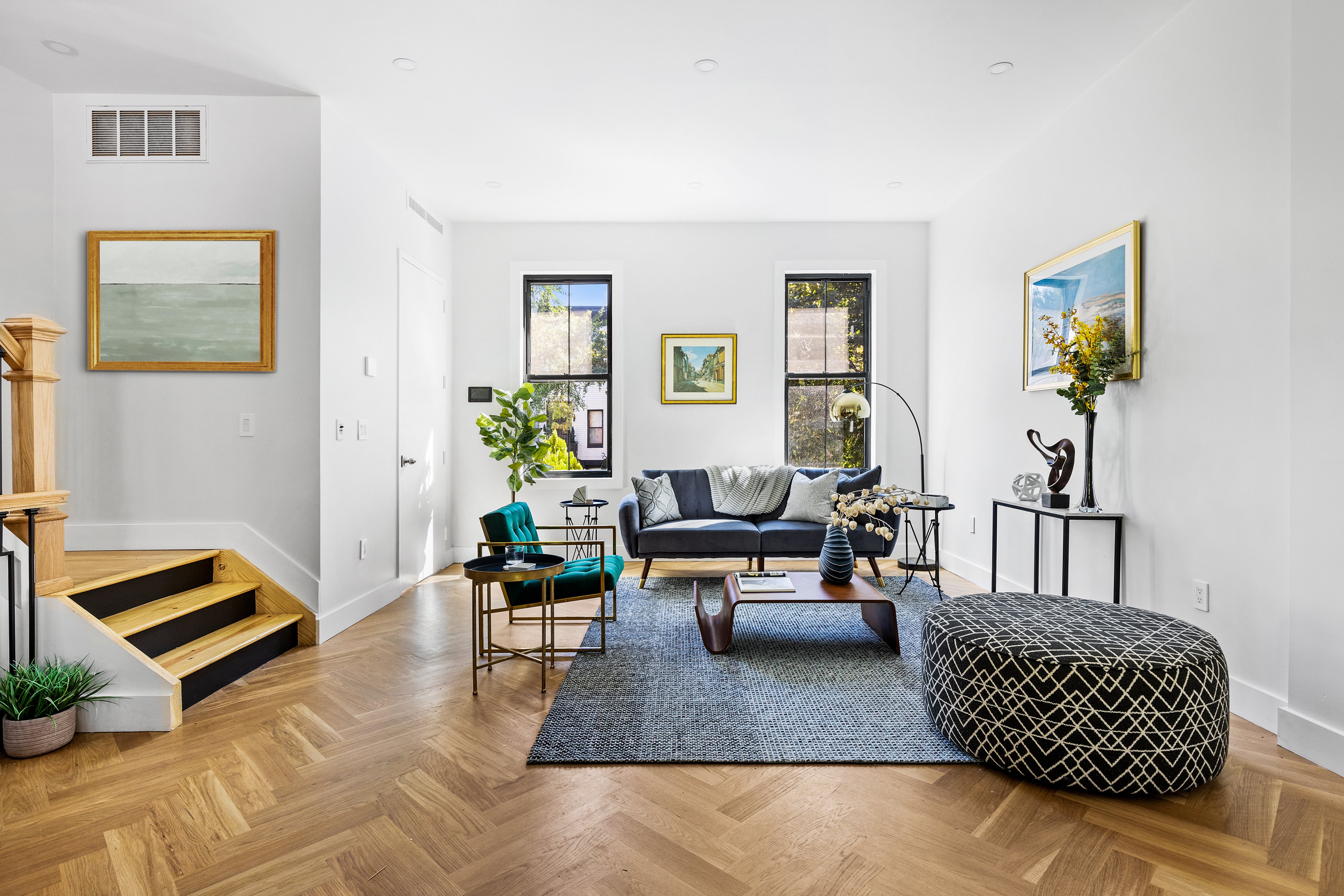 661 Decatur Street Brooklyn, NY 11233 - Photo 3 of 13 a living room with furniture and painting on the wall