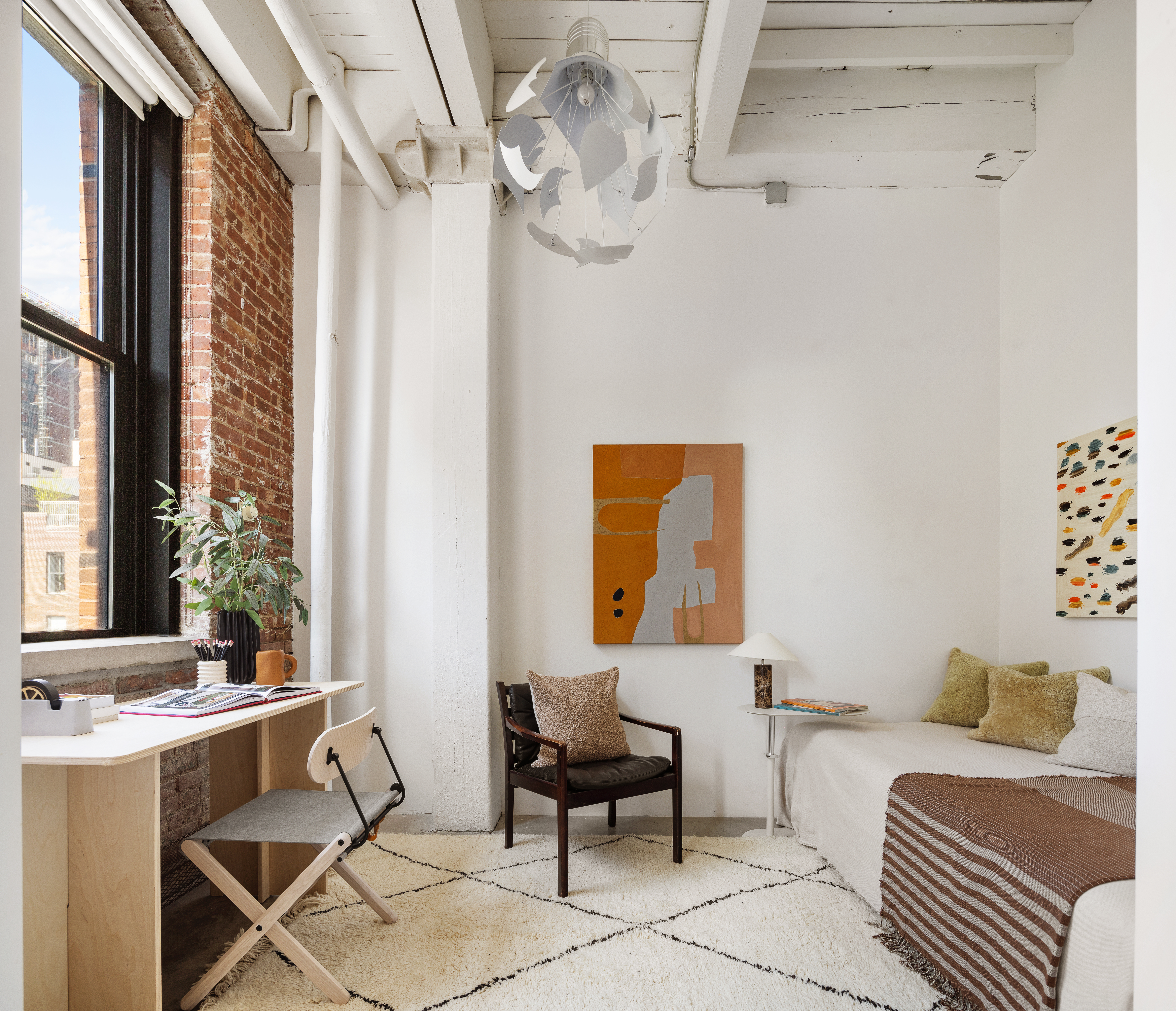 525 West 22nd Street, Unit 4B Manhattan, NY 10011 - Photo 8 of 13 a bedroom with furniture and a window