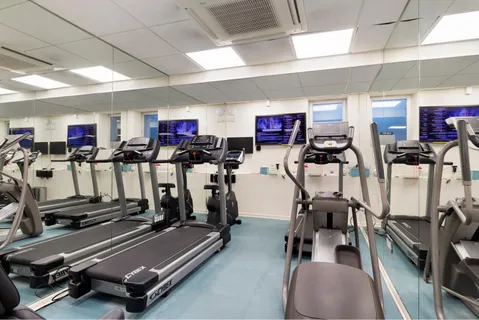 a view of a room with gym equipment