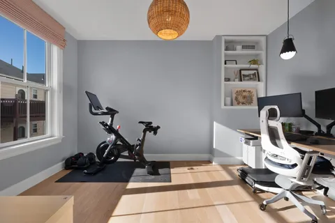 a view of a room with gym equipment