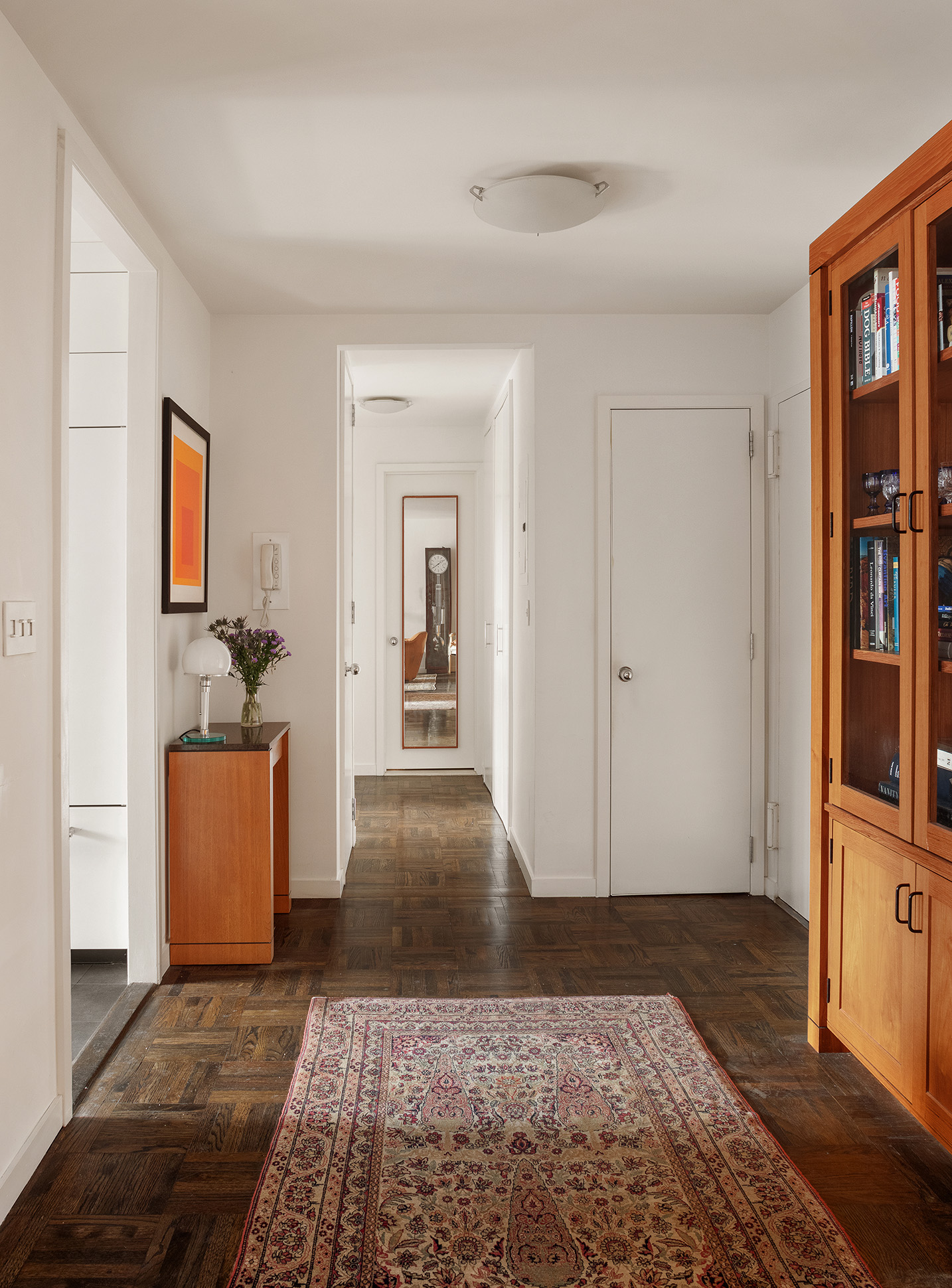 333 East 69th Street, Unit 7F Manhattan, NY 10021 - Photo 5 of 12 a bedroom with furniture and a rug