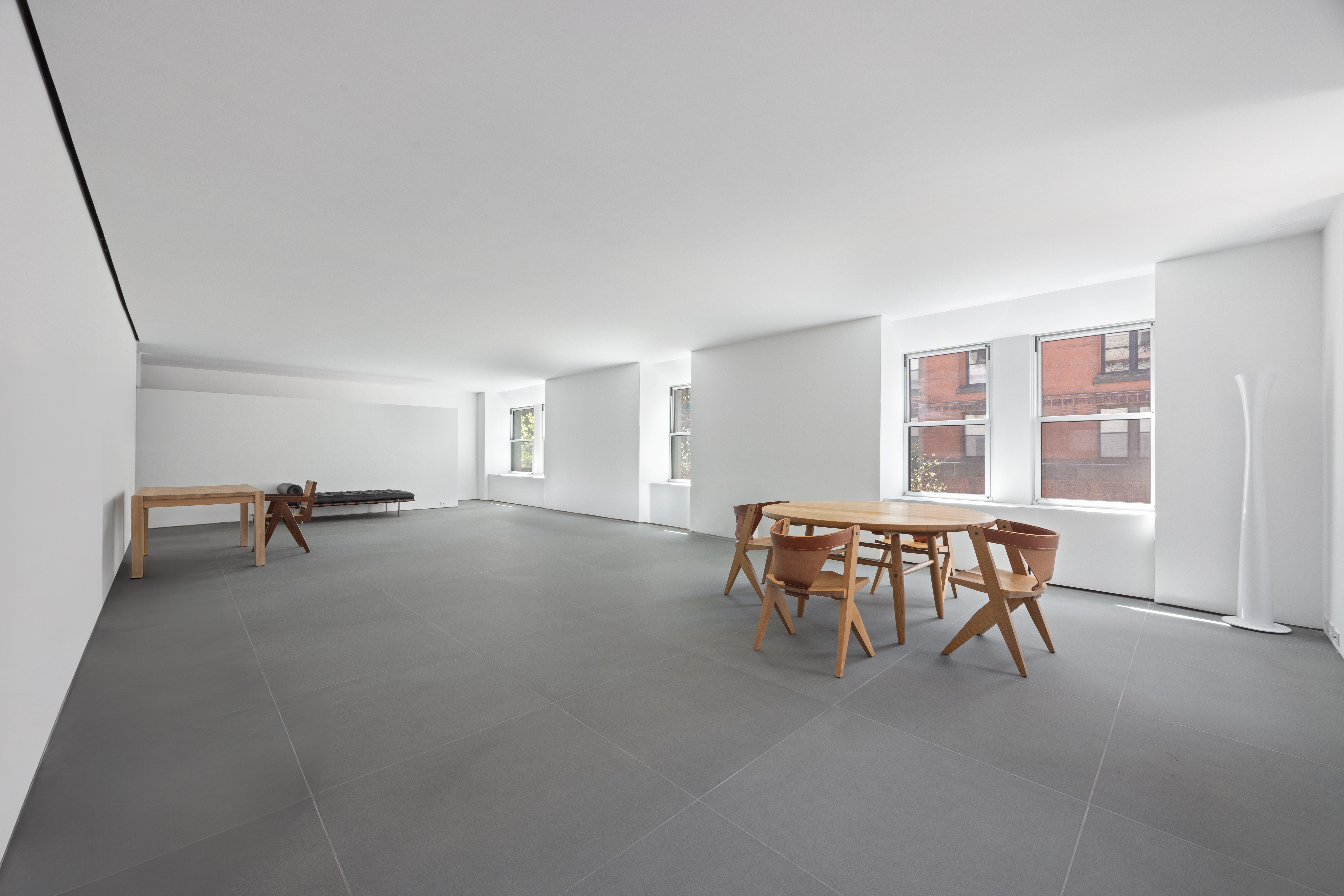 9 Jay Street Manhattan, NY 10013 - Photo 22 of 32 a living room with furniture and a window