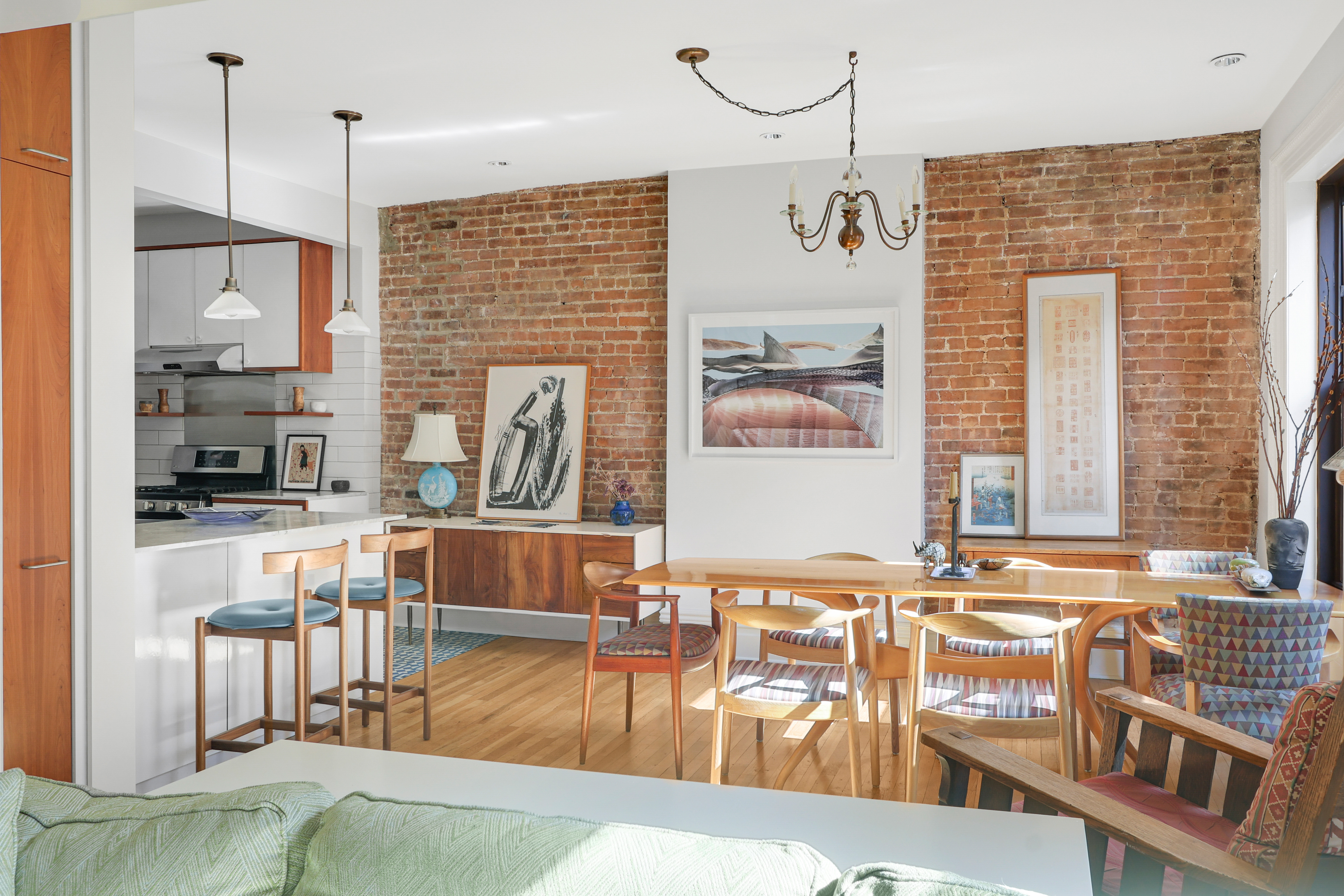 311 West 97th Street, Unit 6E Manhattan, NY 10025 - Photo 3 of 18 a living room with fireplace furniture and a wooden floor