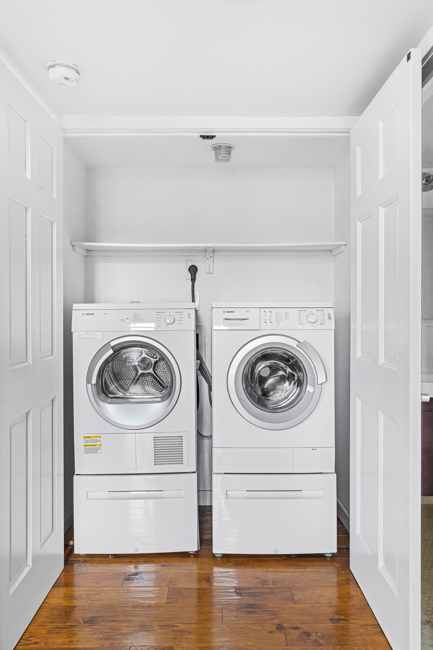 55 Poplar Street, Unit 6K Brooklyn, NY 11201 - Photo 10 of 15 a utility room with dryer and washer