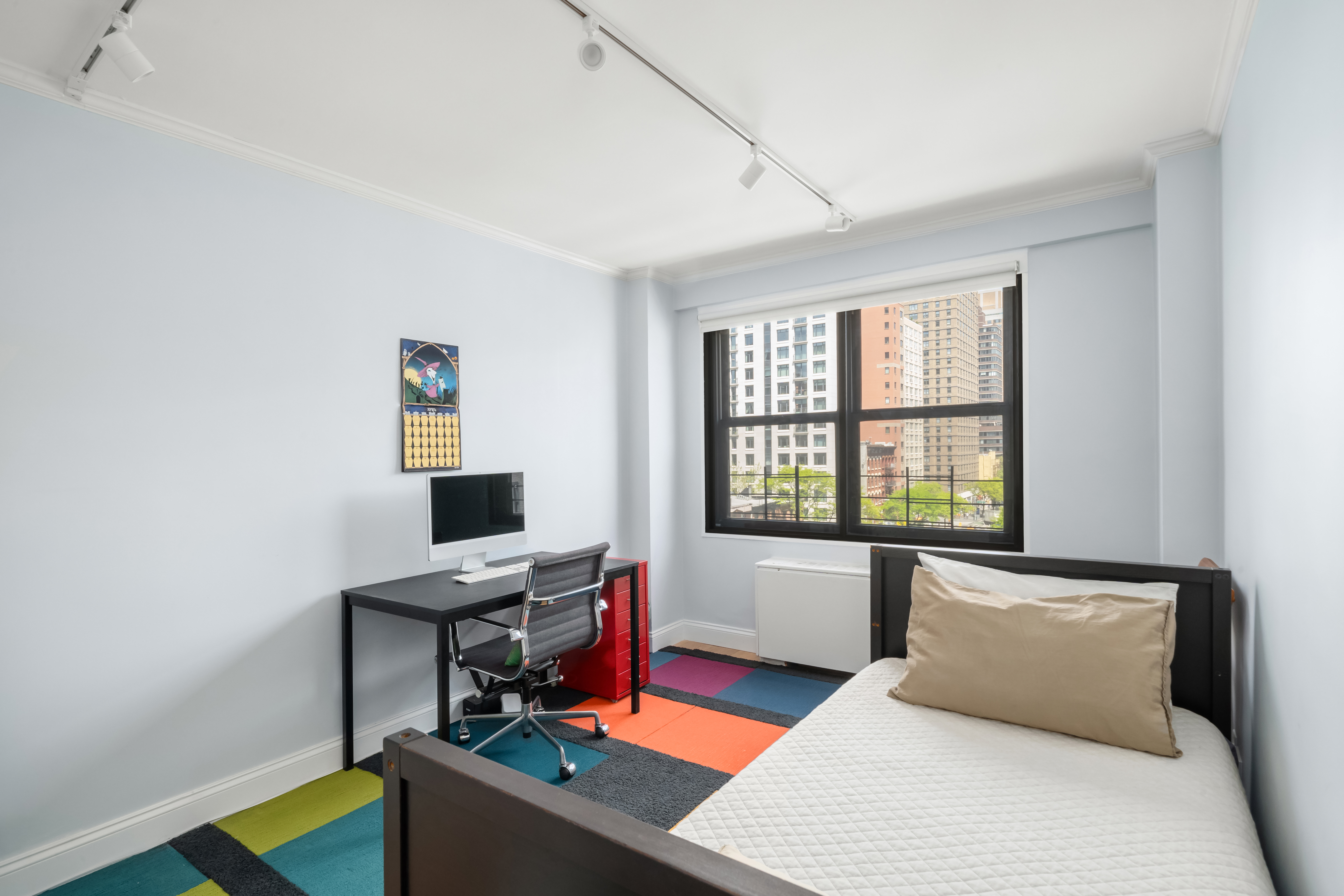 200 East 27th Street, Unit 7EF Manhattan, NY 10016 - Photo 9 of 13 a bedroom with a workspace