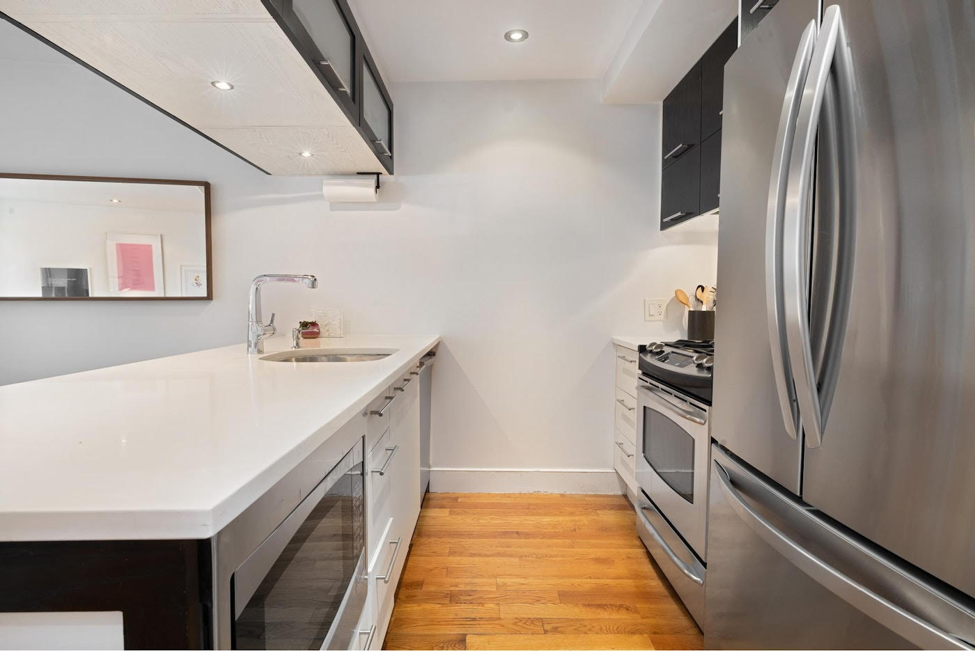 662 Bergen Street, Unit 1A Brooklyn, NY 11238 - Photo 3 of 9 a kitchen with stainless steel appliances a refrigerator and a sink
