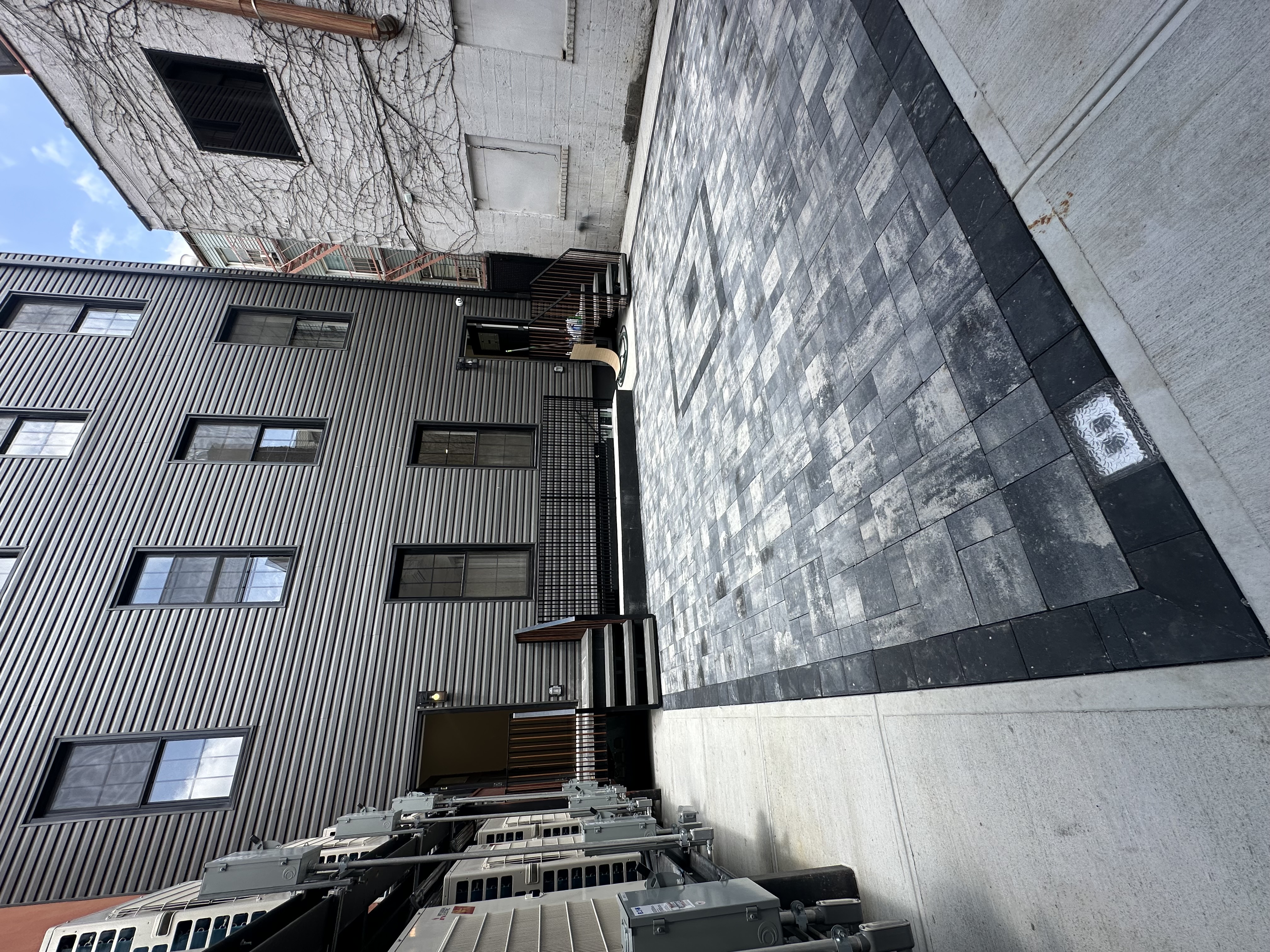 152 North 10th Street, Unit 1R Brooklyn, NY 11249 - Photo 16 of 18 a view of the house with a street