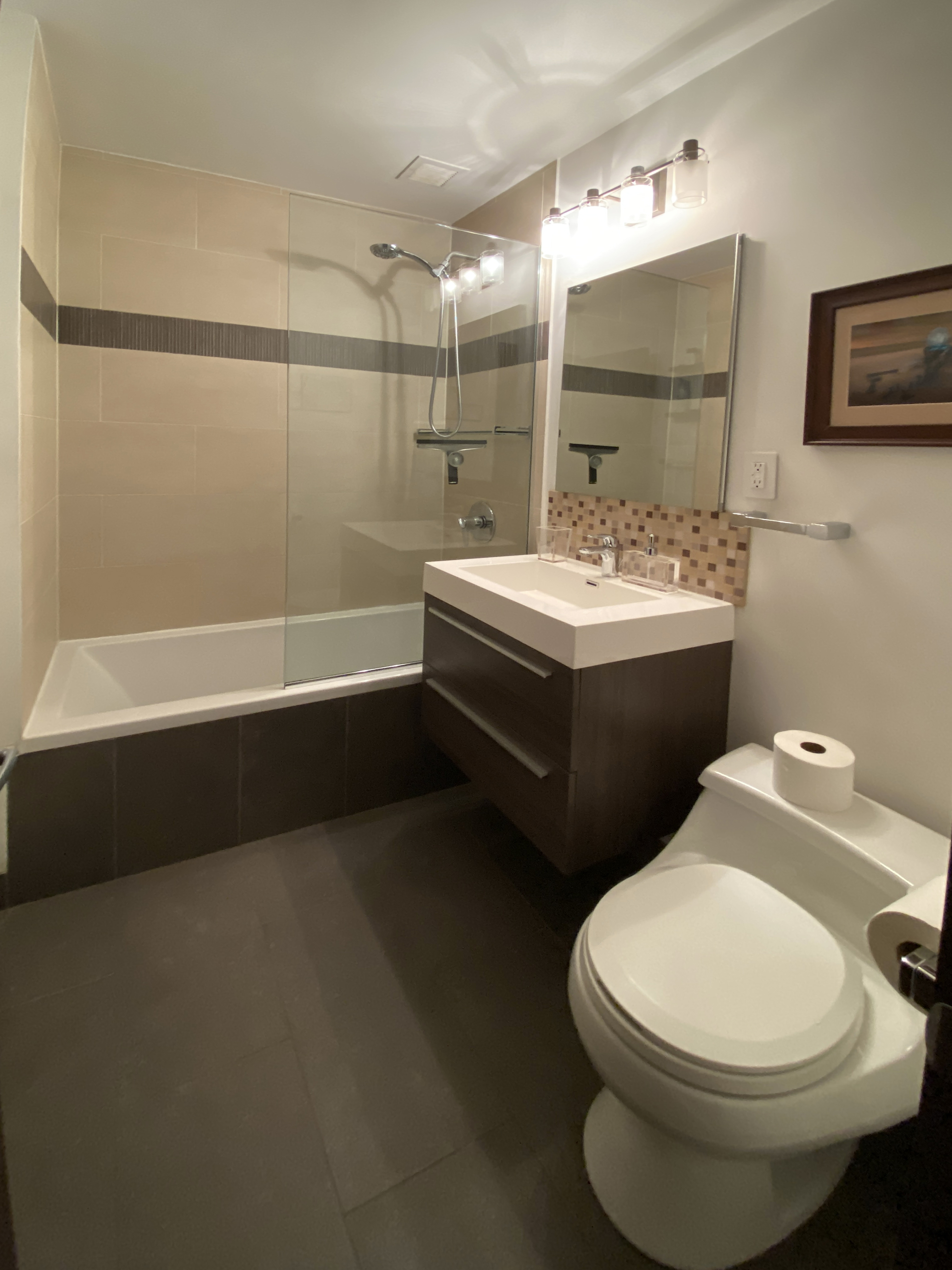 60 Court Street, Unit 2K Brooklyn, NY 11201 - Photo 6 of 6 a bathroom with a sink a toilet and shower