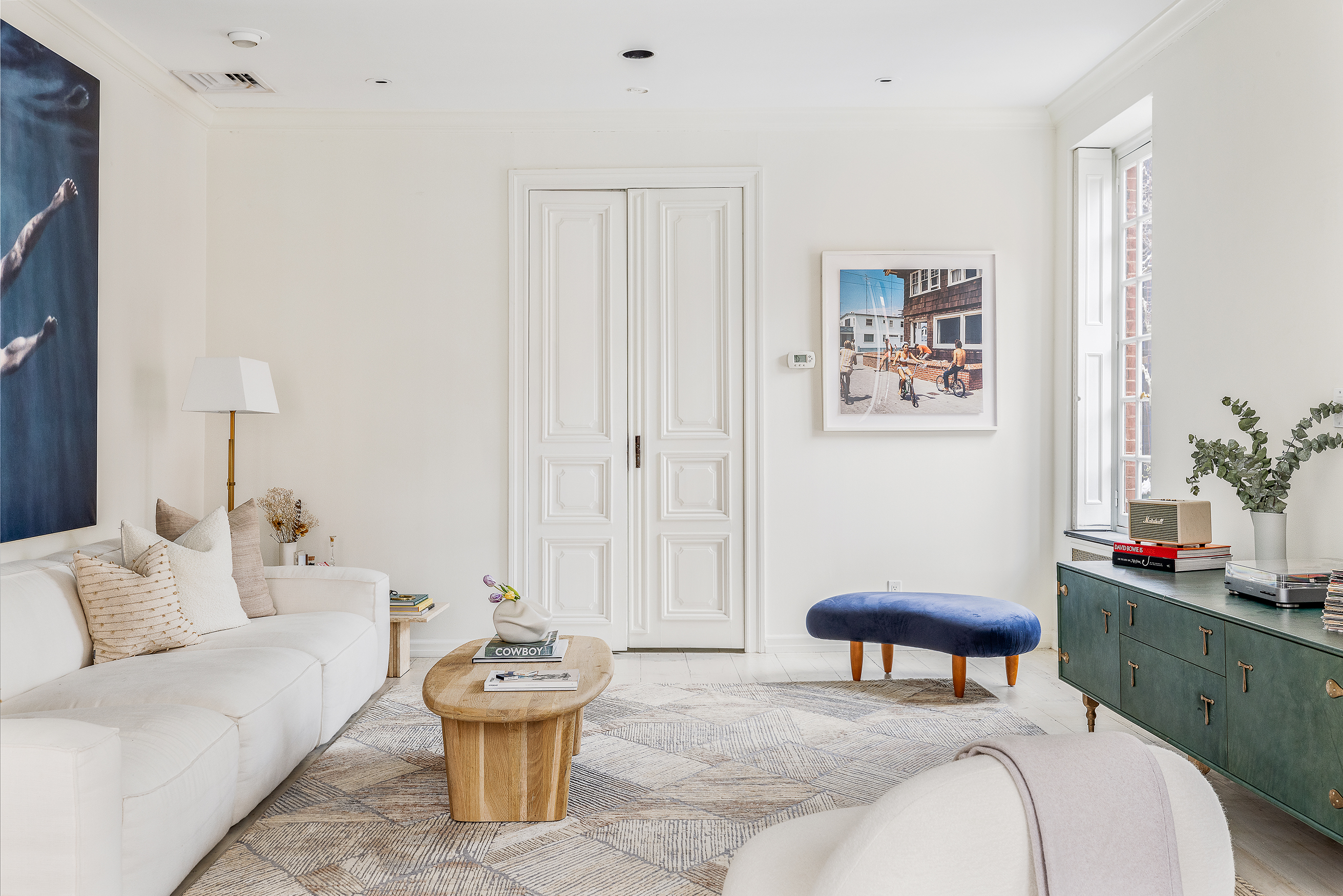 367 Bleecker Street Manhattan, NY 10014 - Photo 3 of 11 a living room with furniture and a potted plant