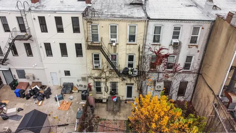 a view of outdoor space with cars