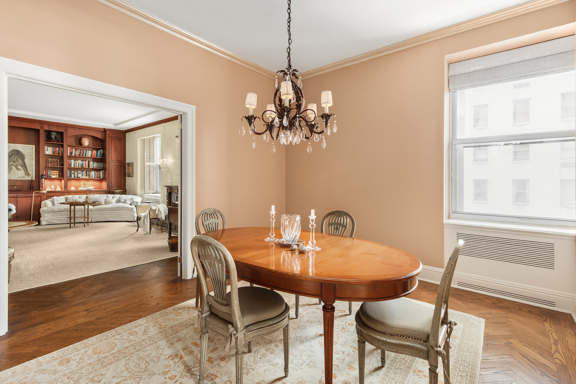 31 East 72nd Street, Unit 7B Manhattan, NY 10021 - Photo 6 of 13 a dining room with furniture and window