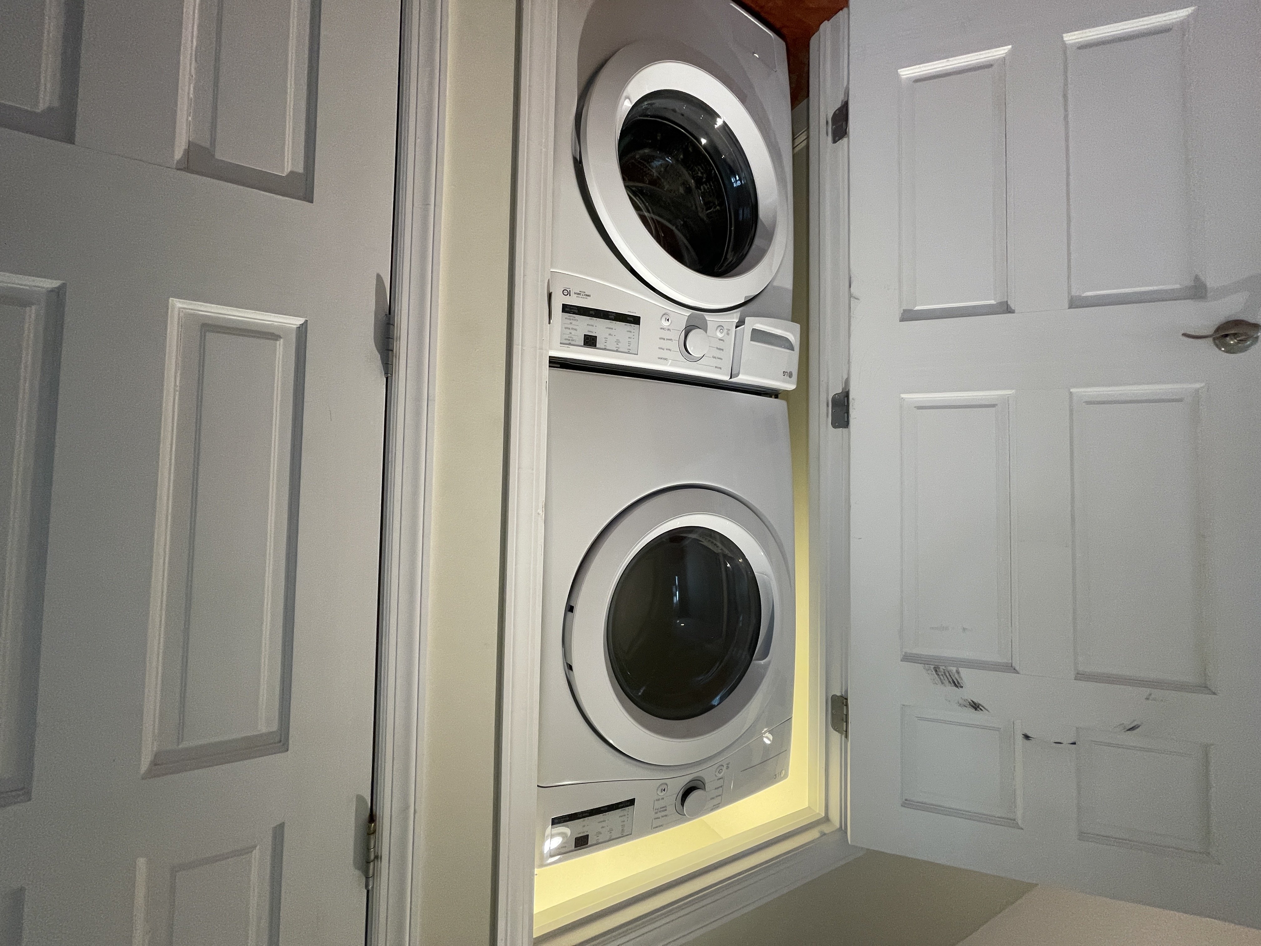 19-14 Astoria Park South, Unit 1B Queens, NY 11102 - Photo 11 of 11 a view of a hallway with washer and dryer