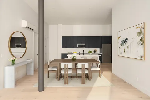 a view of a dining room with furniture