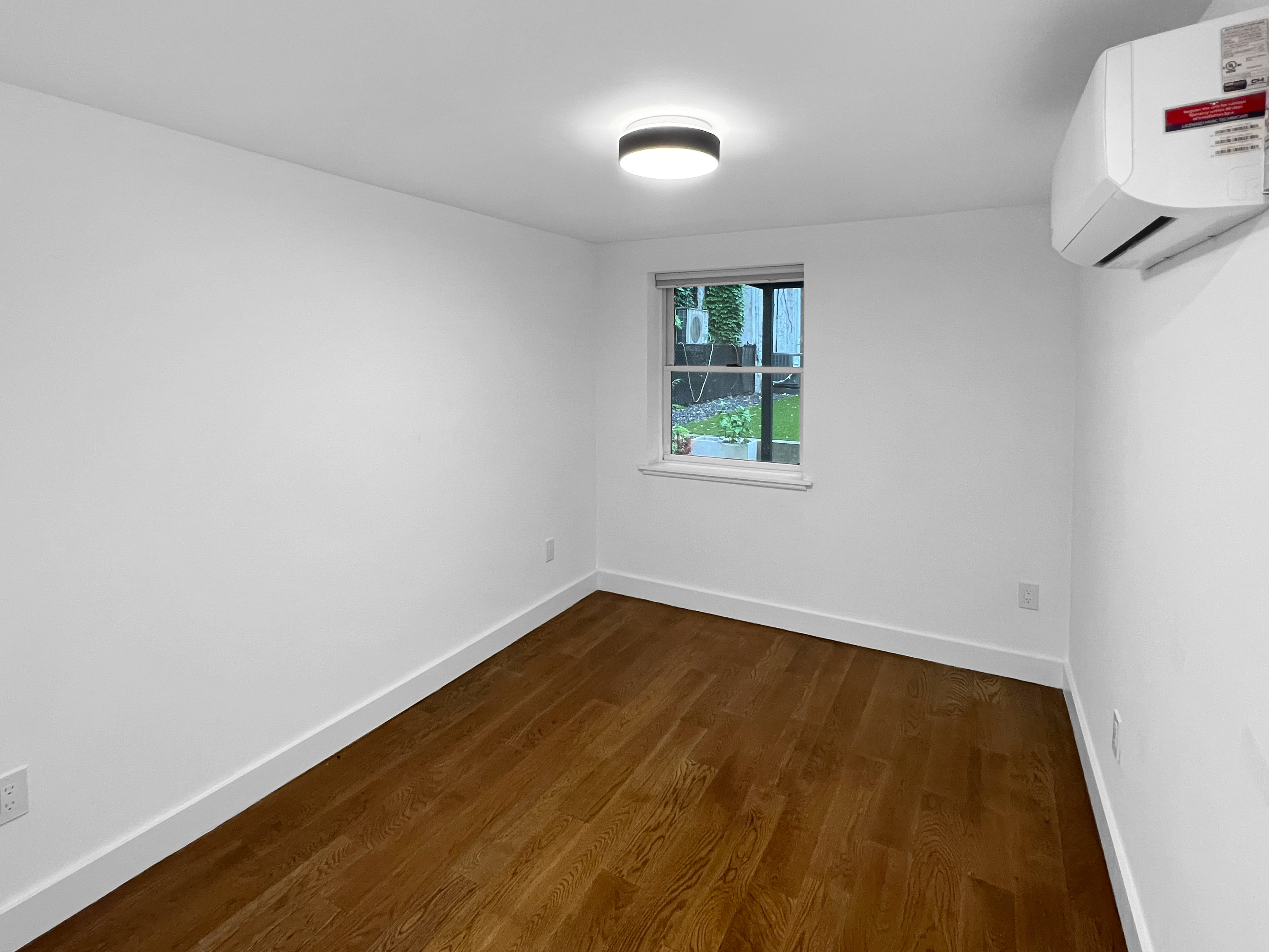 352 Degraw Street, Unit 1 Brooklyn, NY 11231 - Photo 12 of 20 an empty room with a window