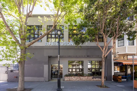a front view of a building with street view