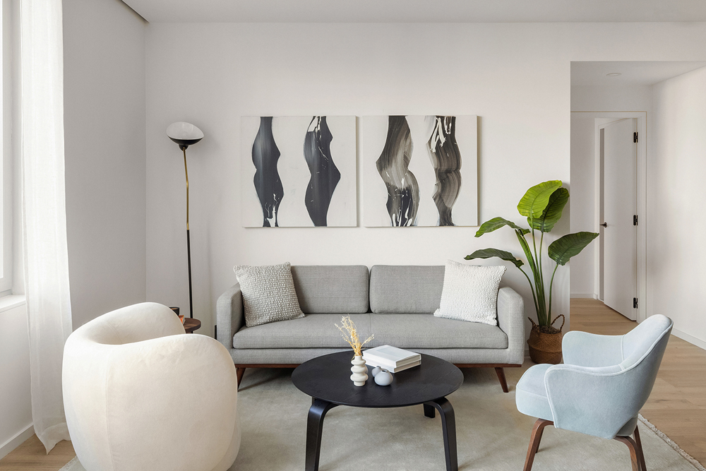 66 Clinton Street, Unit 4B Manhattan, NY 10002 - Photo 3 of 18 a living room with furniture and a potted plant