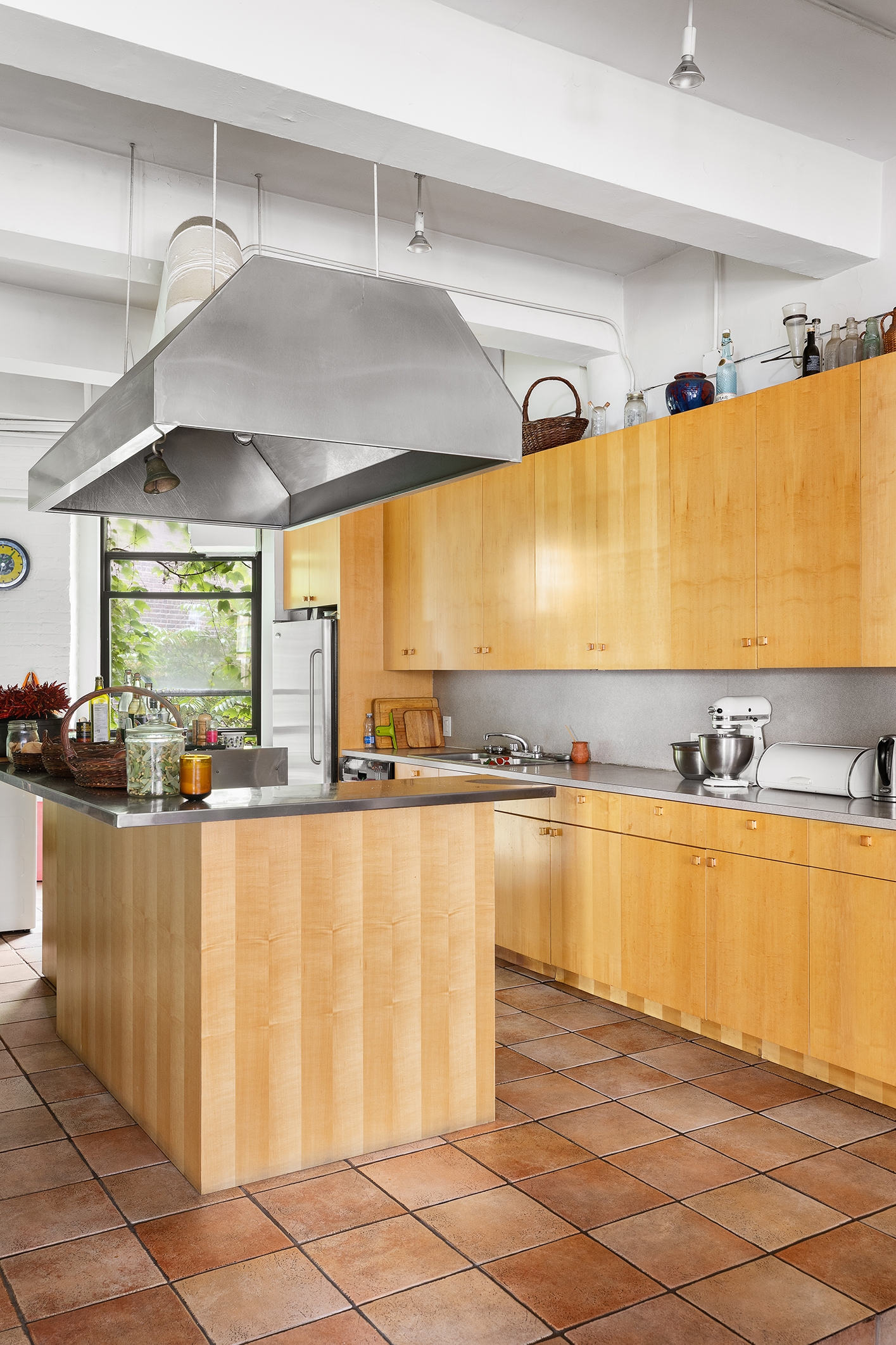 477 Washington Street Manhattan, NY 10013 - Photo 8 of 20 a kitchen with stainless steel appliances granite countertop a sink and a stove