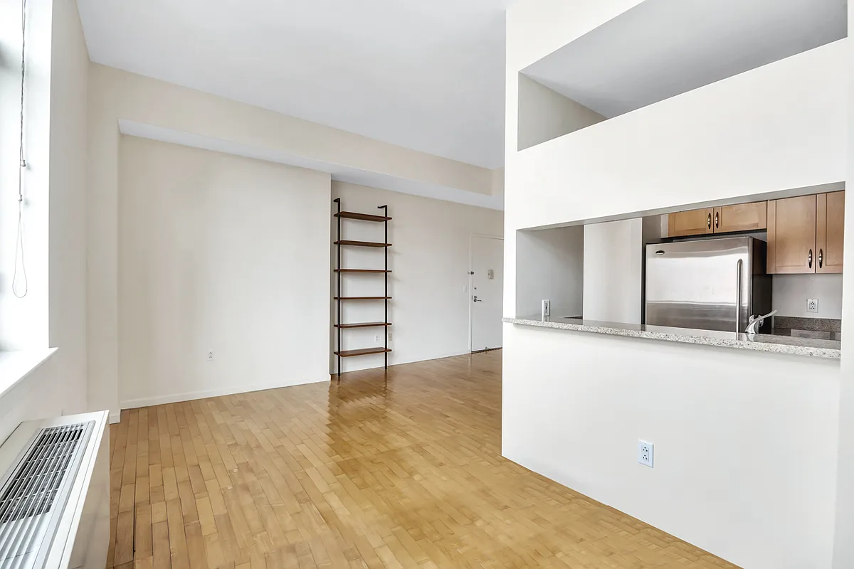 250 East 30th Street, Unit 10H Manhattan, NY 10016 - Photo 5 of 9 a view of kitchen with wooden floor