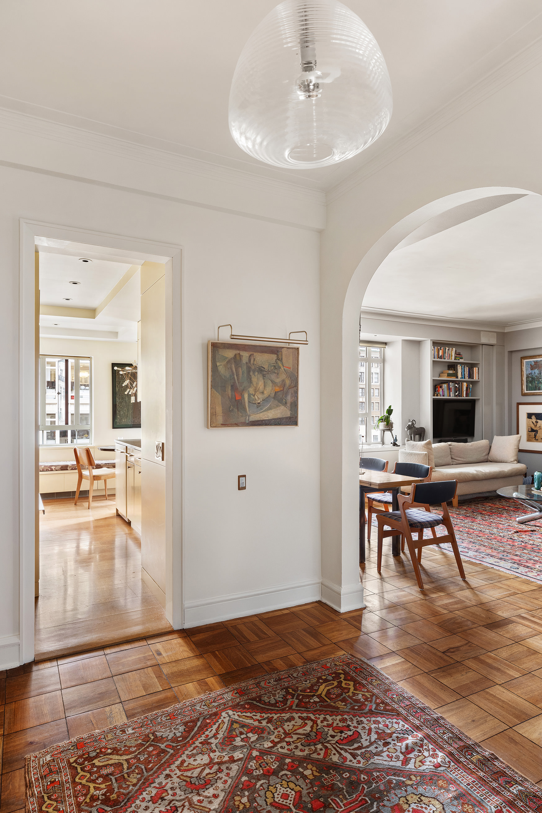 25 Central Park West, Unit 11C Manhattan, NY 10023 - Photo 3 of 17 a living room with furniture and wooden floor