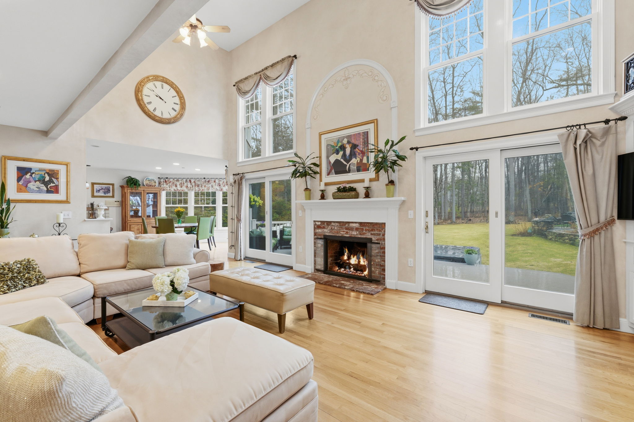 20 Marshall Path Acton, MA 01720 - Photo 4 of 19 a living room with furniture a table and a fireplace