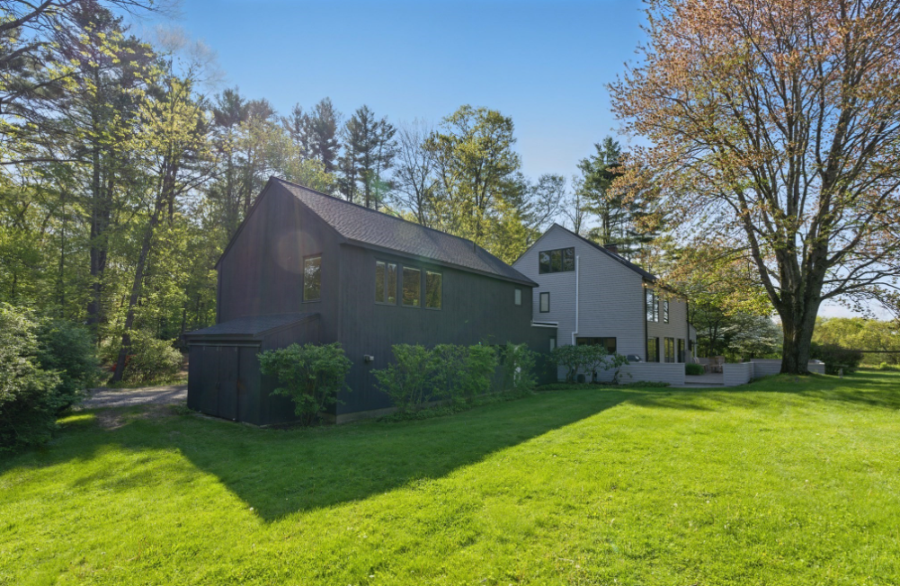 38 Gray Road Andover, MA 01810 - Photo 3 of 28 a backyard of a house with plants and large tree