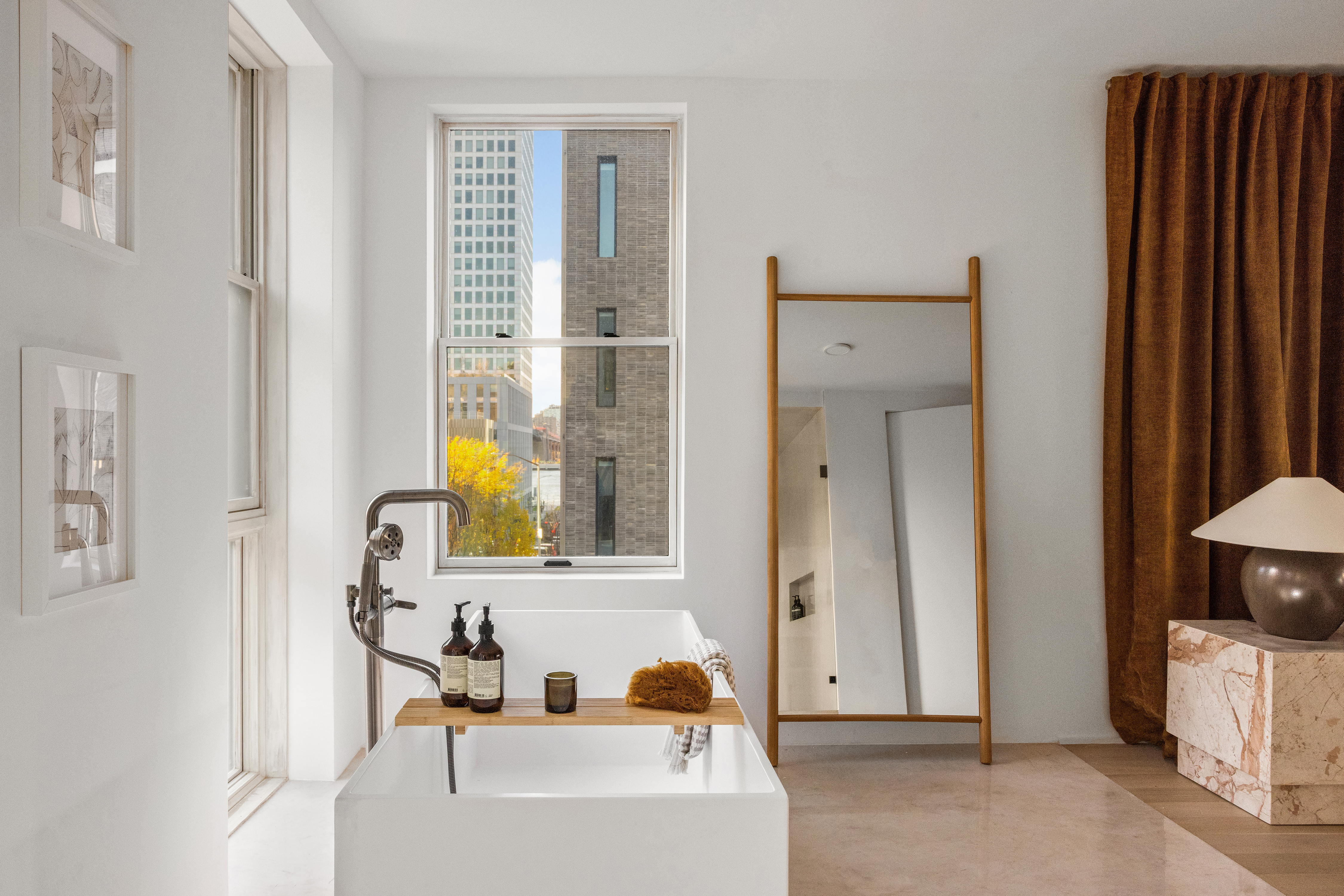 61 South 4th Street Brooklyn, NY 11249 - Photo 16 of 29 a bathroom with a tub and a sink