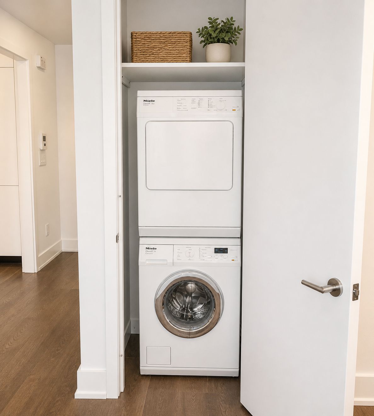 50 Riverside Boulevard, Unit 3T Manhattan, NY 10069 - Photo 7 of 14 a view of a hallway with washer and dryer