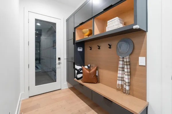 a view of hallway with livingroom and furniture