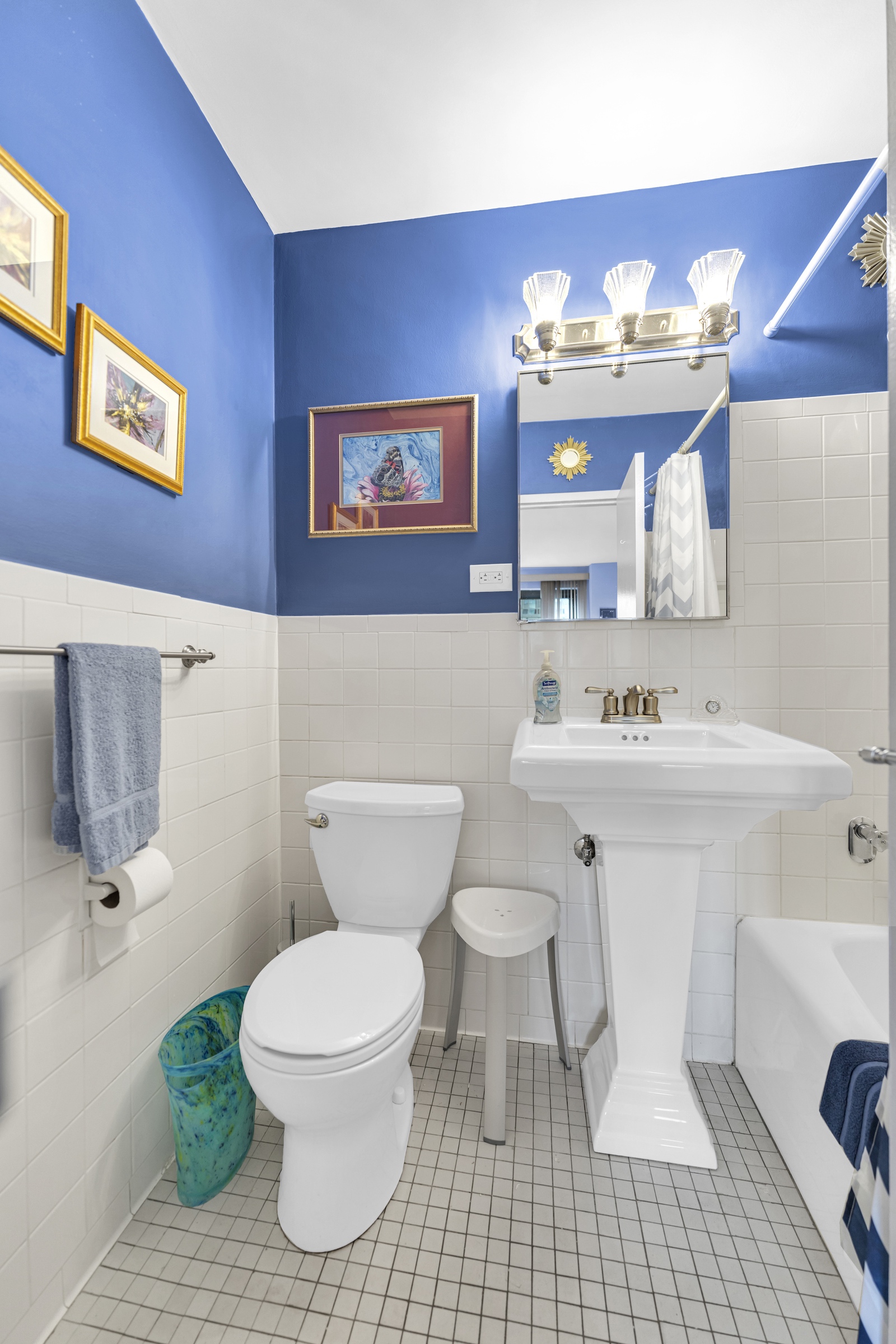 180 West End Avenue, Unit 9P Manhattan, NY 10023 - Photo 9 of 13 a bathroom with a sink toilet and a mirror