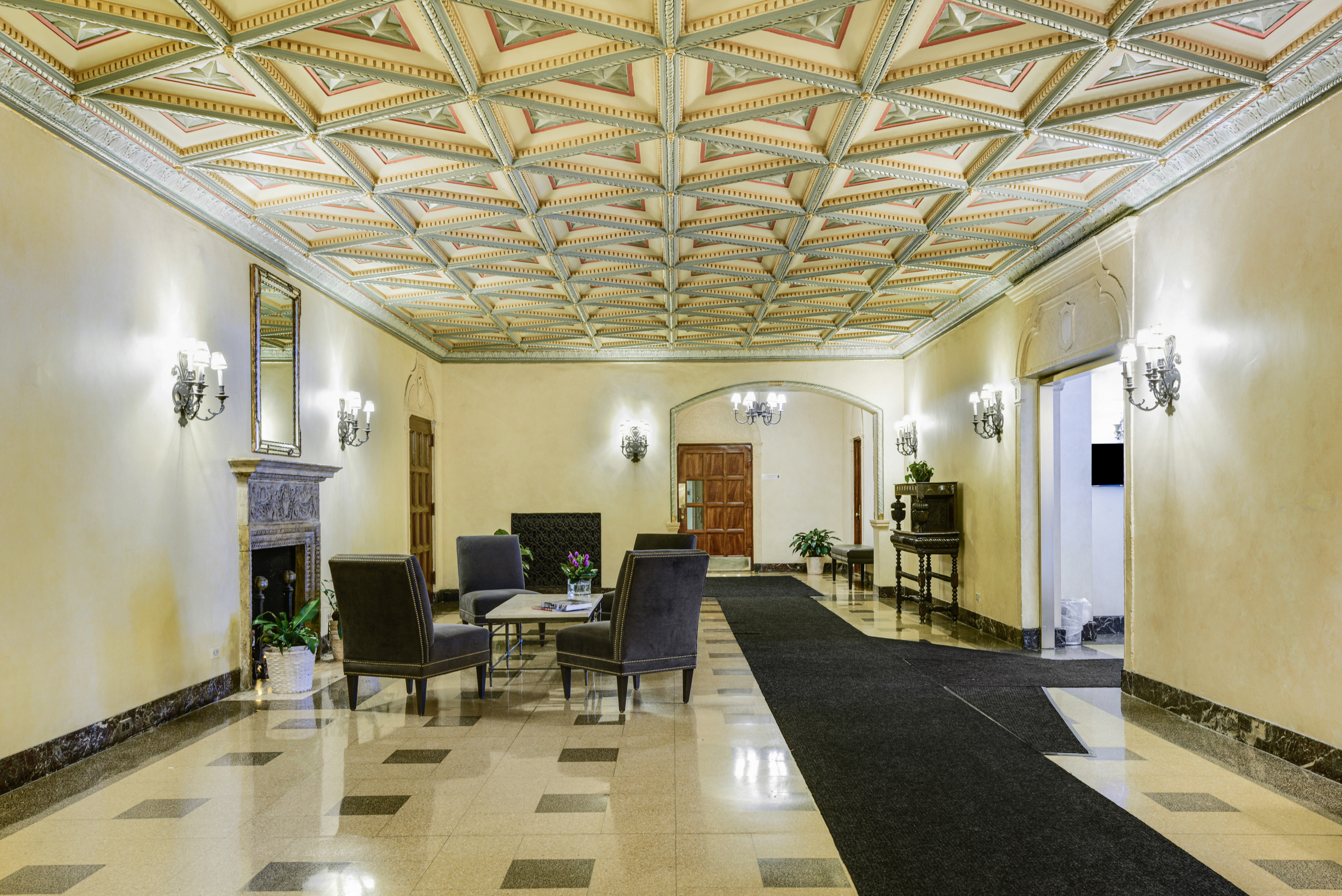 205 East 78th Street, Unit 7K Manhattan, NY 10075 - Photo 13 of 14 a lobby with furniture and rug