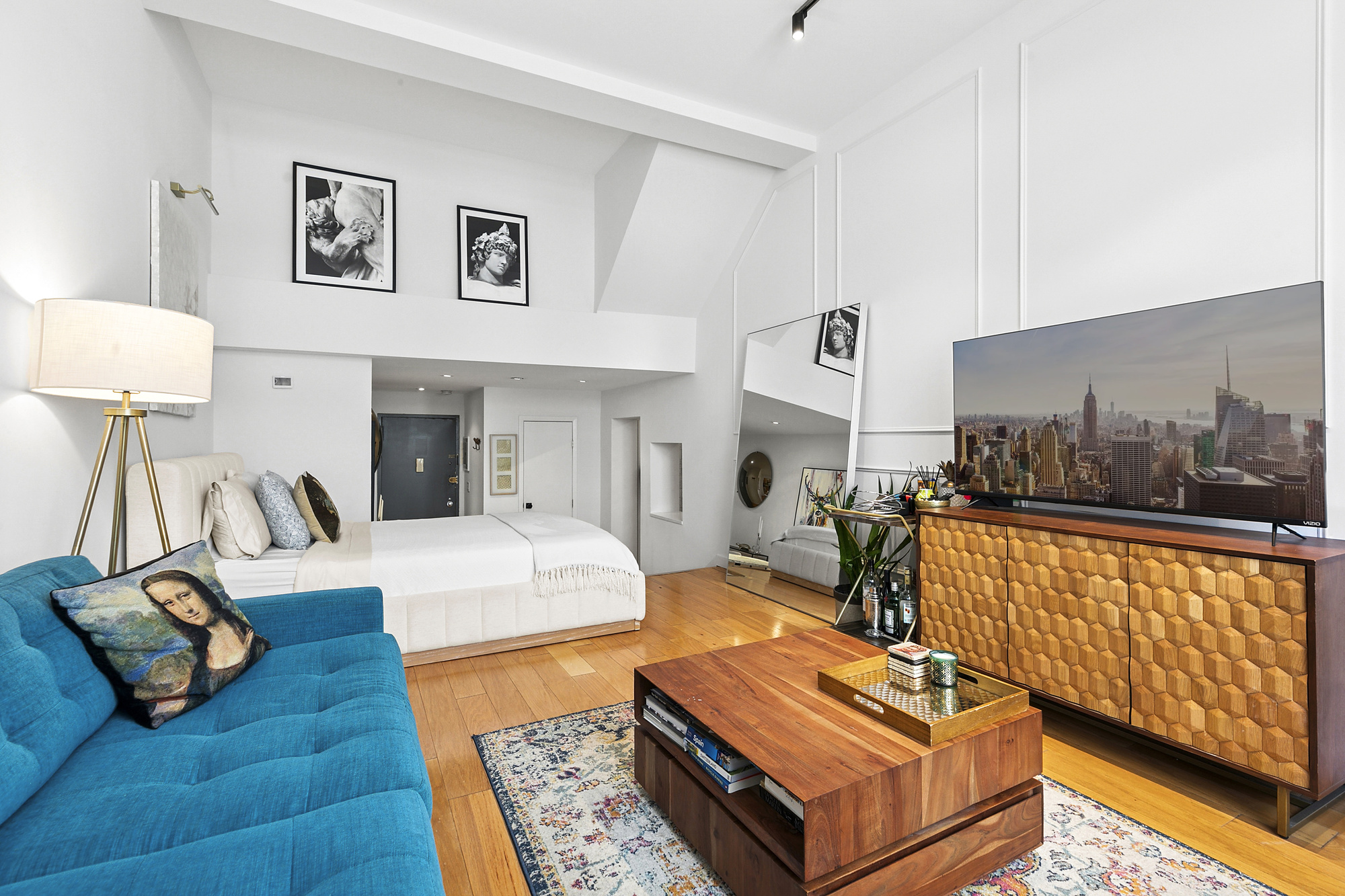 a living room with furniture and a table