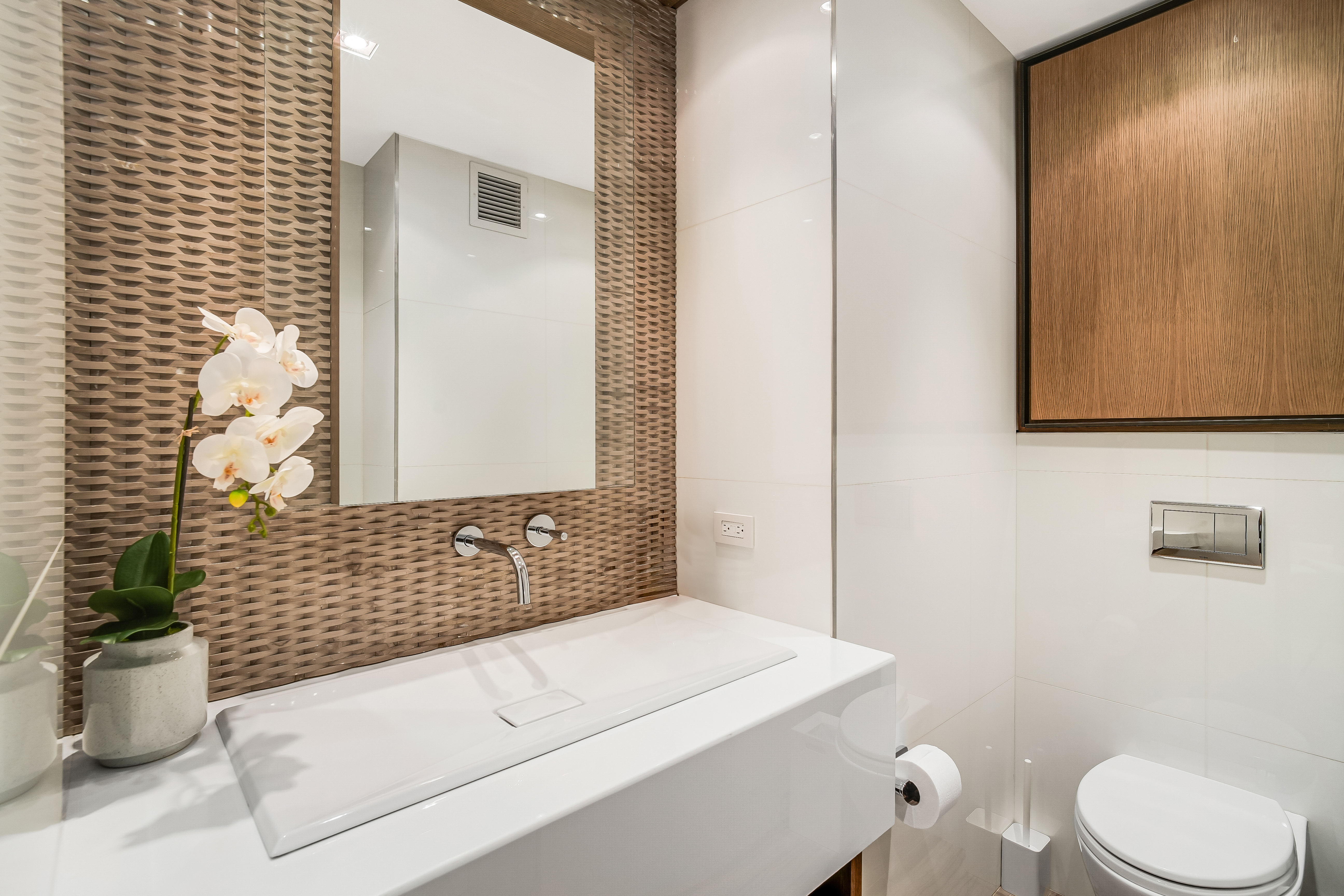 1 5th Avenue, Unit 5GH Manhattan, NY 10003 - Photo 12 of 26 a bathroom with a sink a toilet and shower