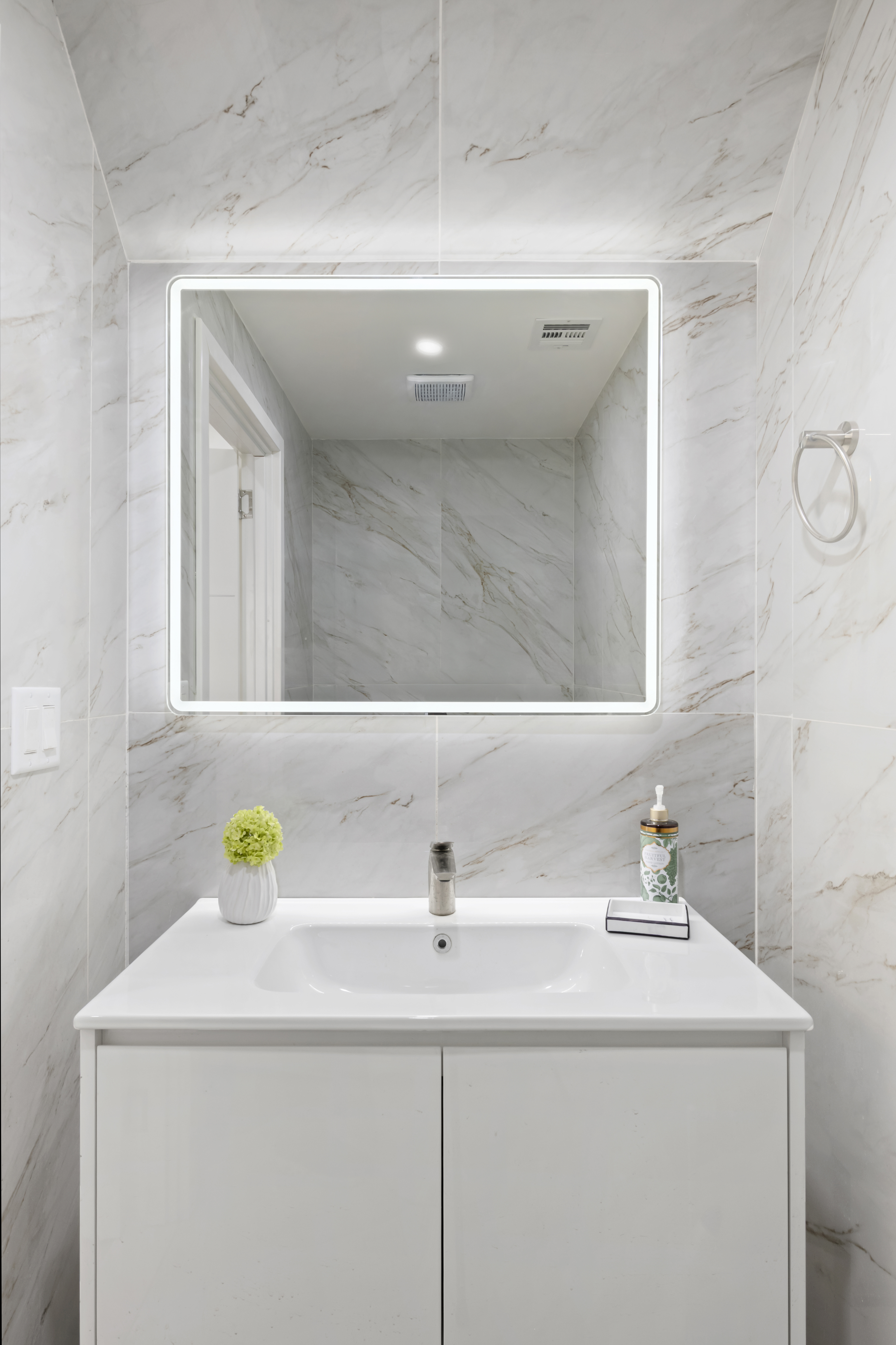 84 Himrod Street Brooklyn, NY 11221 - Photo 23 of 35 a bathroom with a sink and a mirror