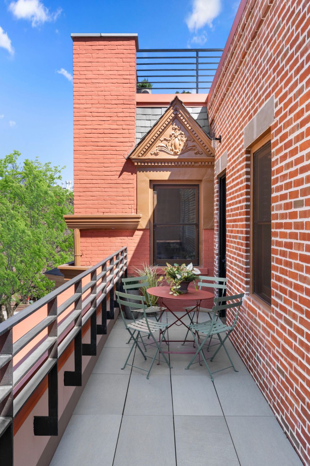 1370 Dean Street, Unit PHD Brooklyn, NY 11216 - Photo 8 of 12 a view of a chairs and table in a balcony