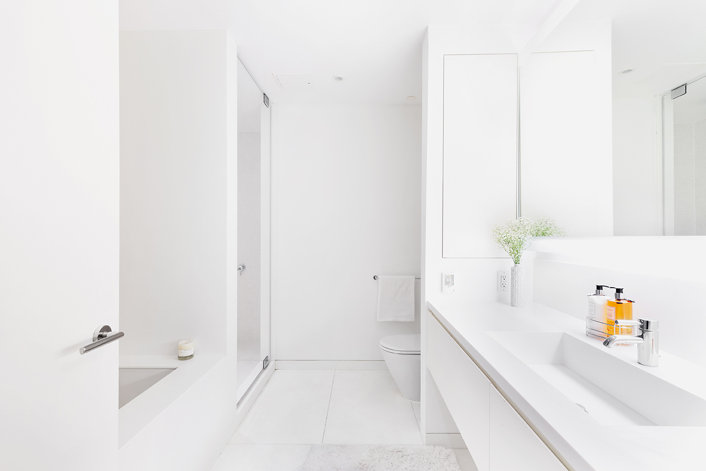 1 Grand Army Plaza, Unit 5E Brooklyn, NY 11238 - Photo 6 of 21 a bathroom with a bathtub sink and mirror