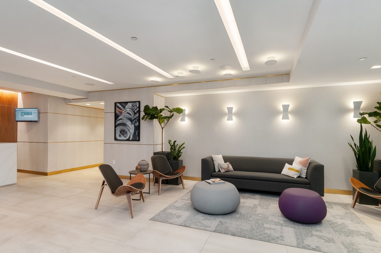 440 Kent Avenue, Unit 22C Brooklyn, NY 11249 - Photo 7 of 14 a living room with furniture and a potted plant