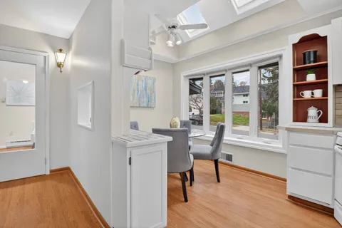 a view of a livingroom with furniture and window