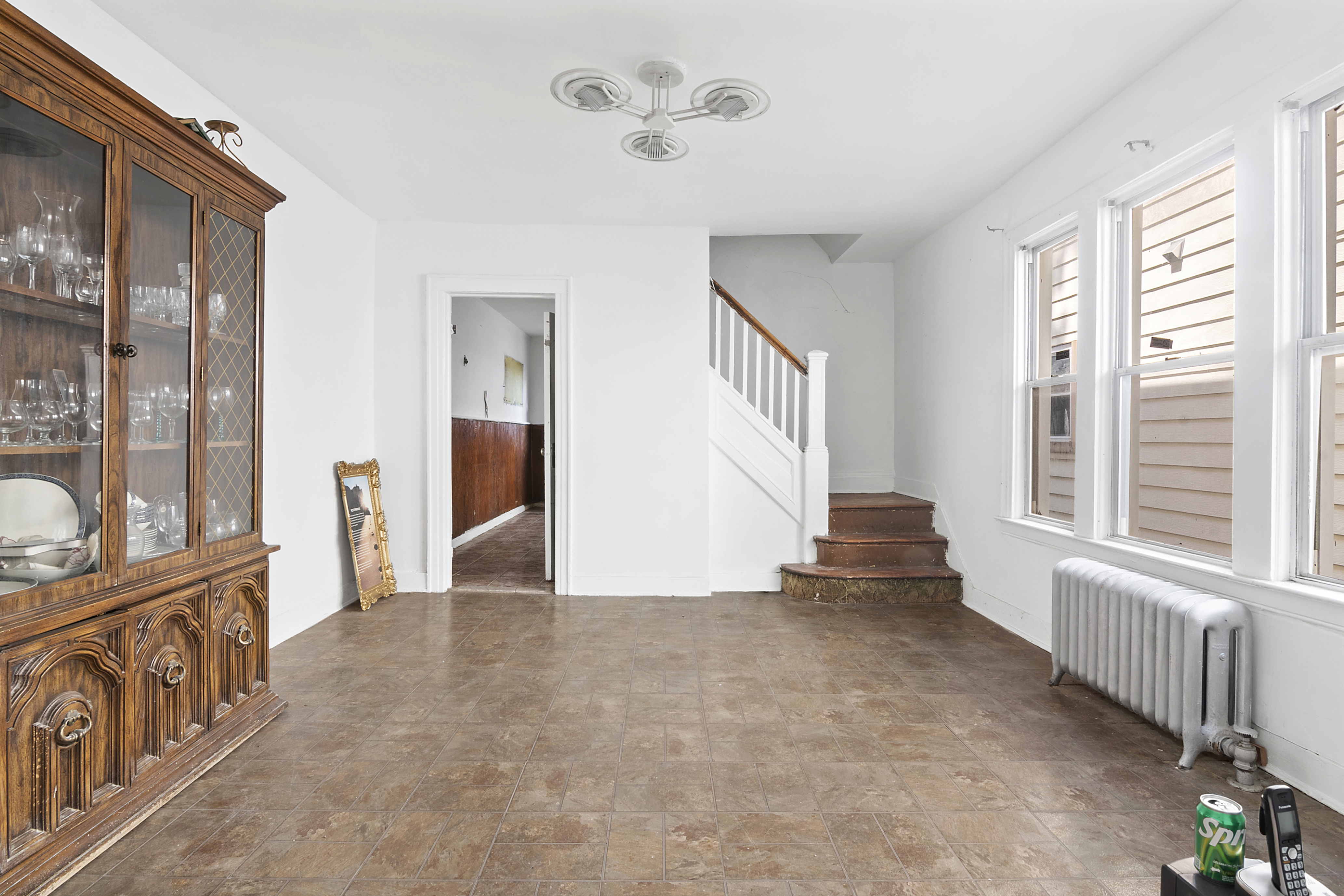 266 East 43rd Street Brooklyn, NY 11203 - Photo 2 of 11 a view of an empty room and window