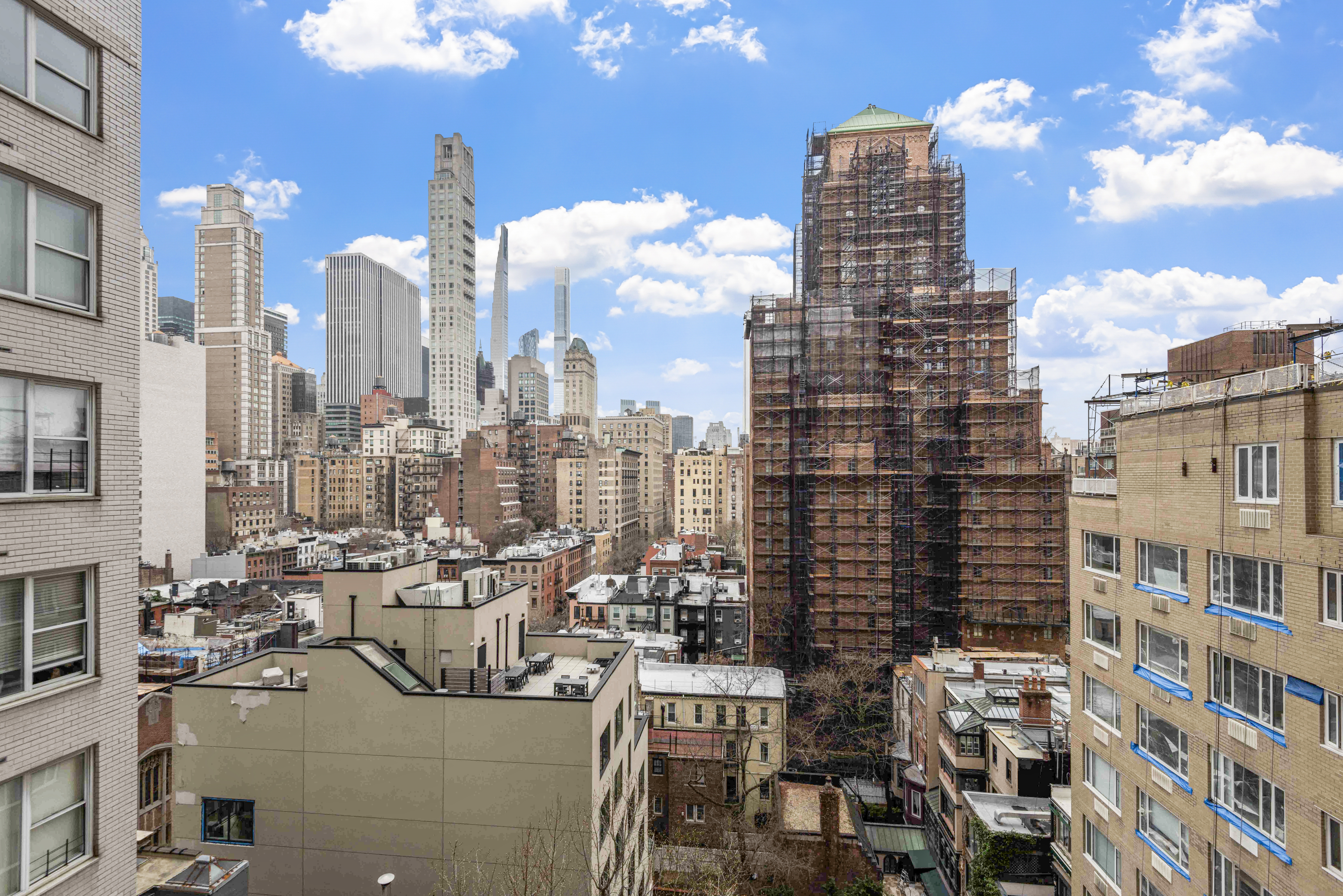 175 East 62nd Street, Unit 12A Manhattan, NY 10065 - Photo 10 of 24 a city view with tall buildings