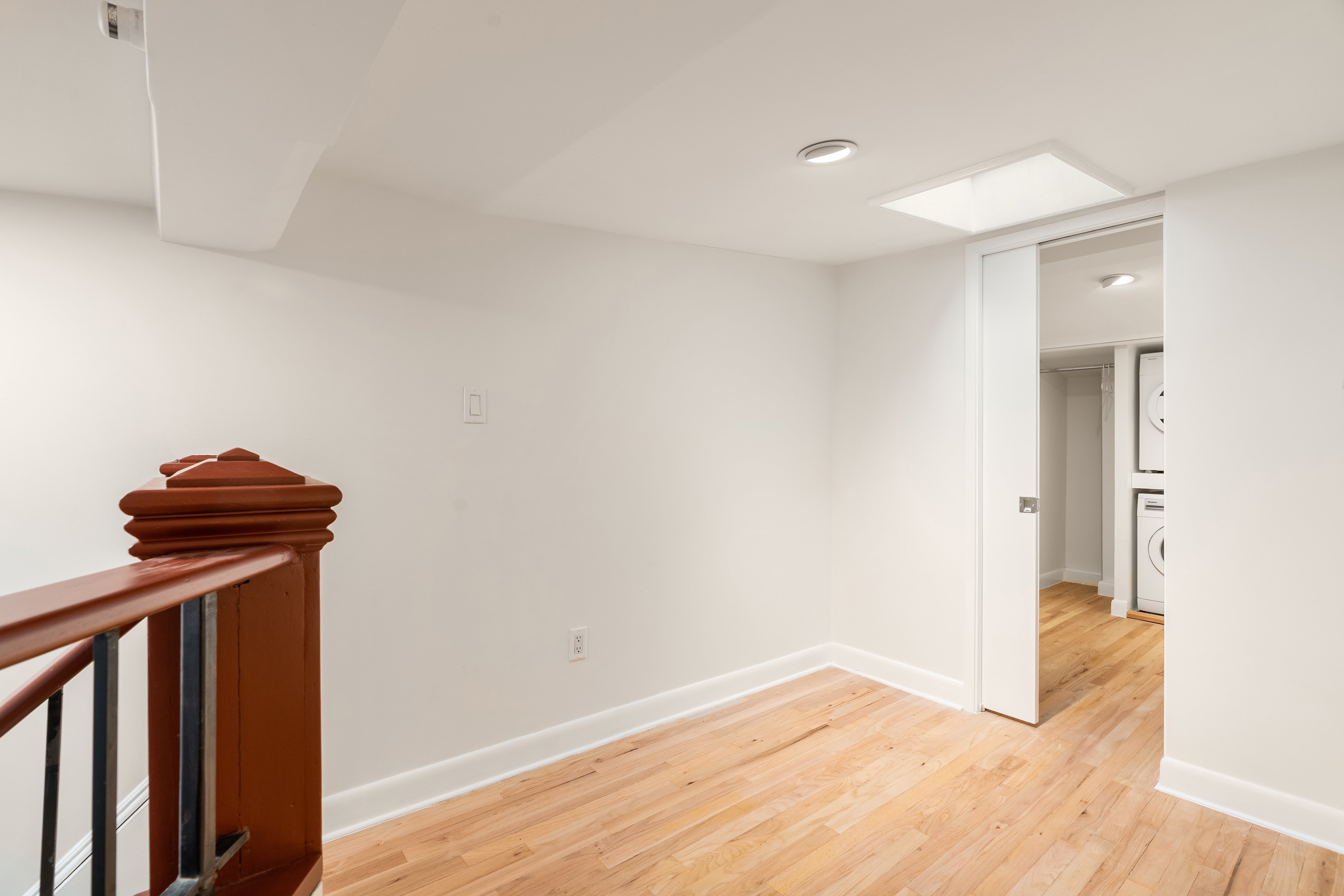 51 East 10th Street, Unit 9 Manhattan, NY 10003 - Photo 6 of 9 a view of empty room with wooden floor