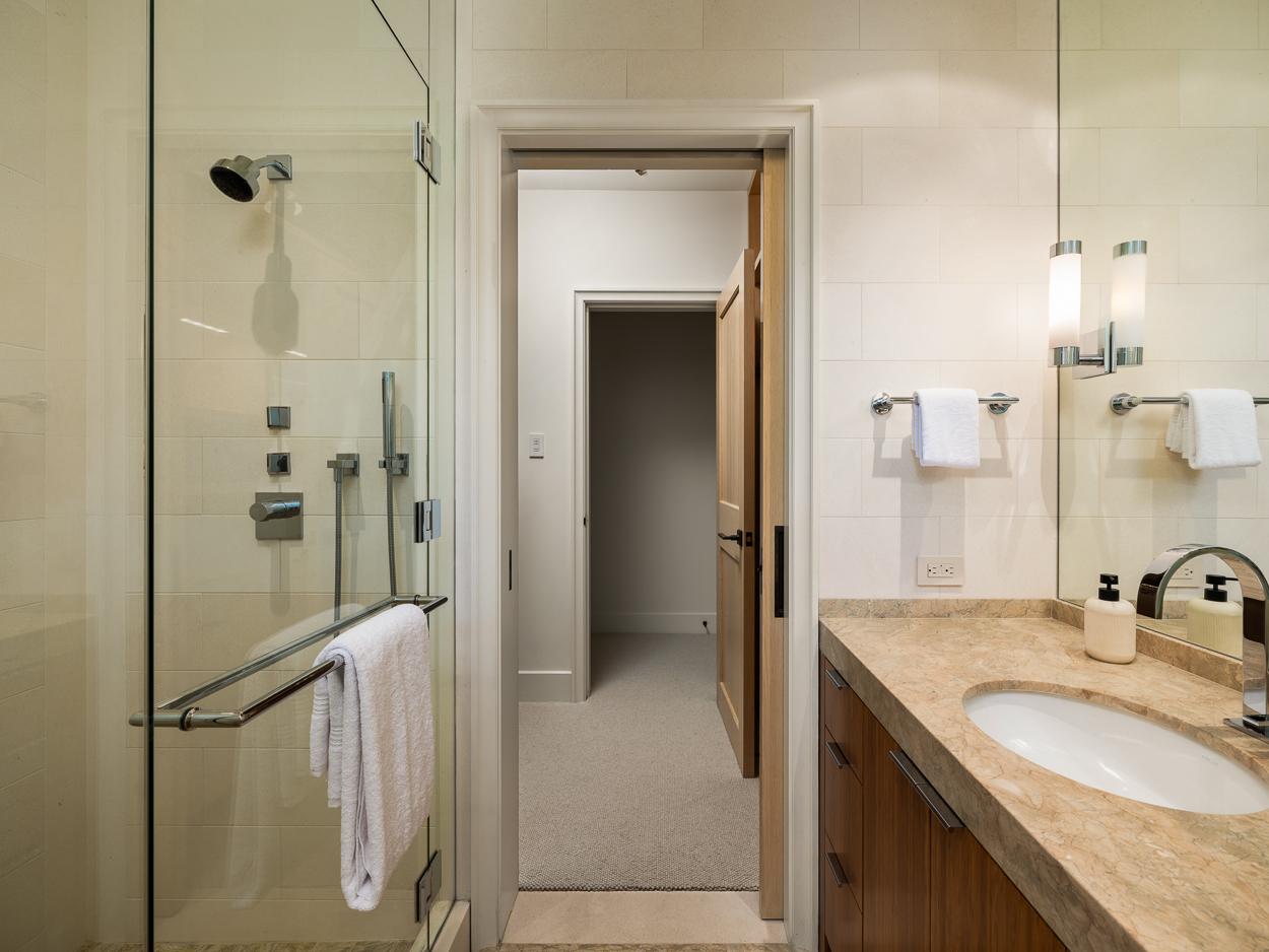 20 Crest Road Belvedere, CA 94920 - Photo 39 of 66 a bathroom with a granite countertop shower sink and mirror