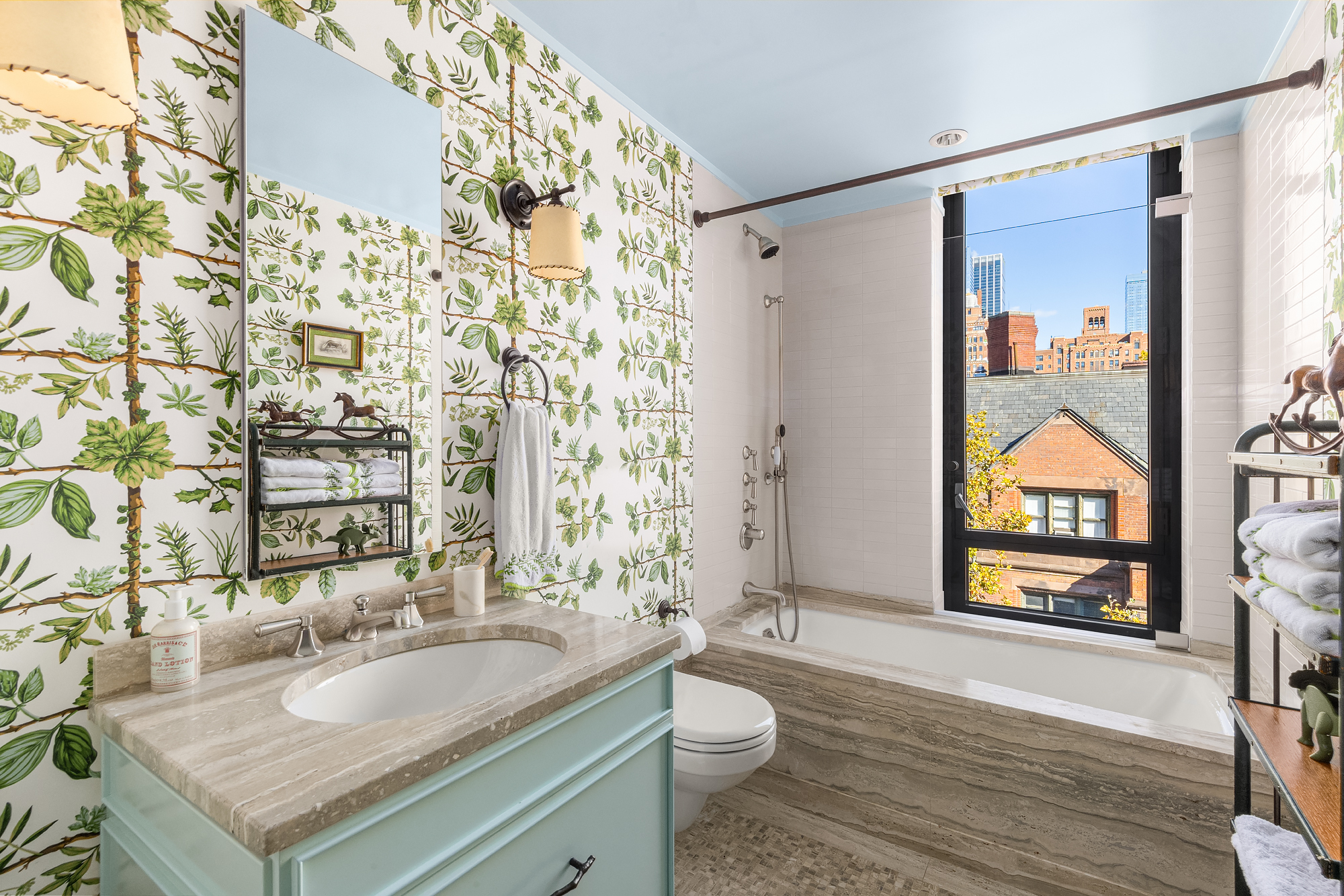 455 West 20th Street, Unit PH Manhattan, NY 10011 - Photo 17 of 21 a bathroom with a granite countertop sink and a mirror