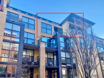 a red brick building with large windows