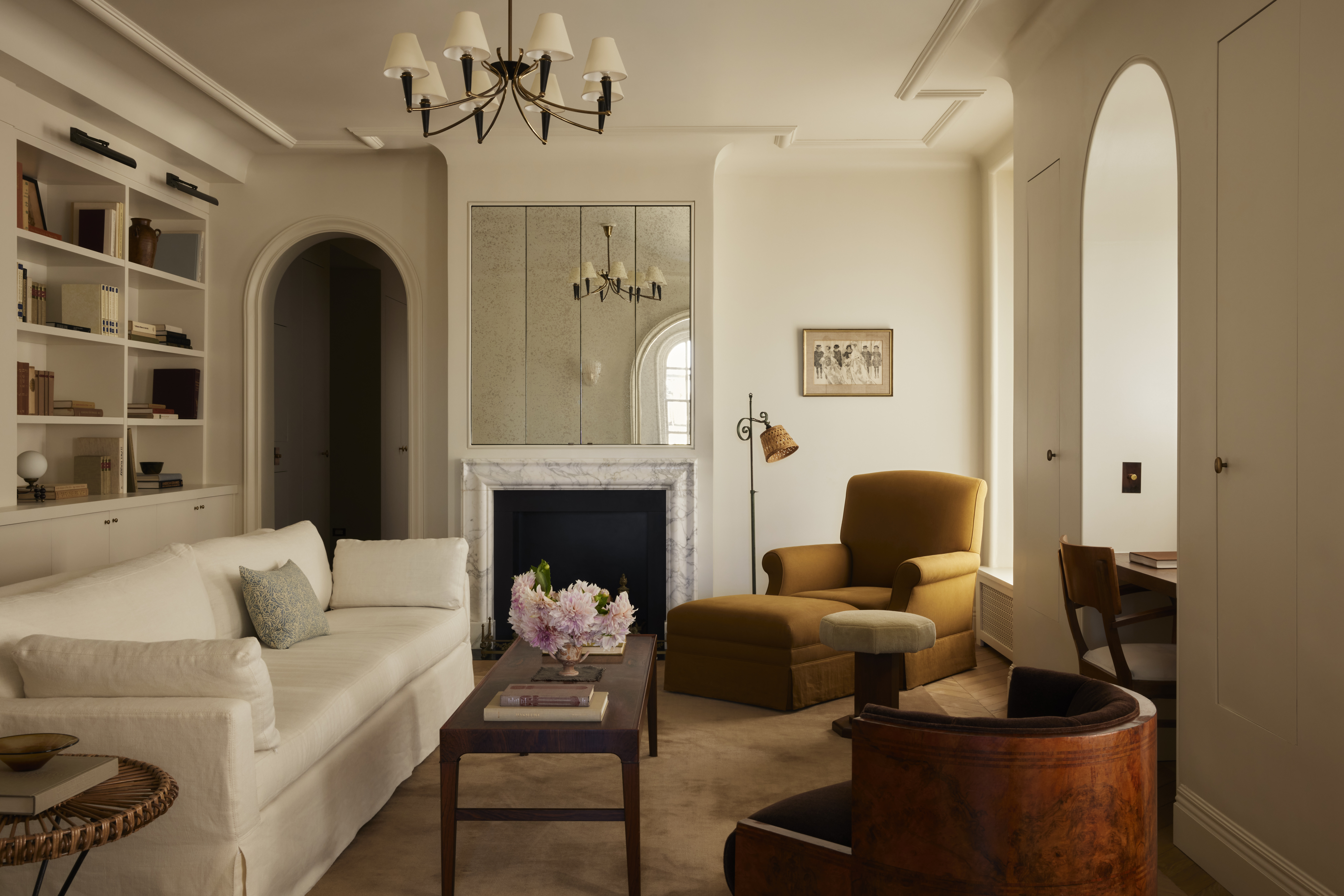 2109 Broadway, Unit 15/157 Manhattan, NY 10023 - Photo 2 of 19 a living room with furniture and a fireplace