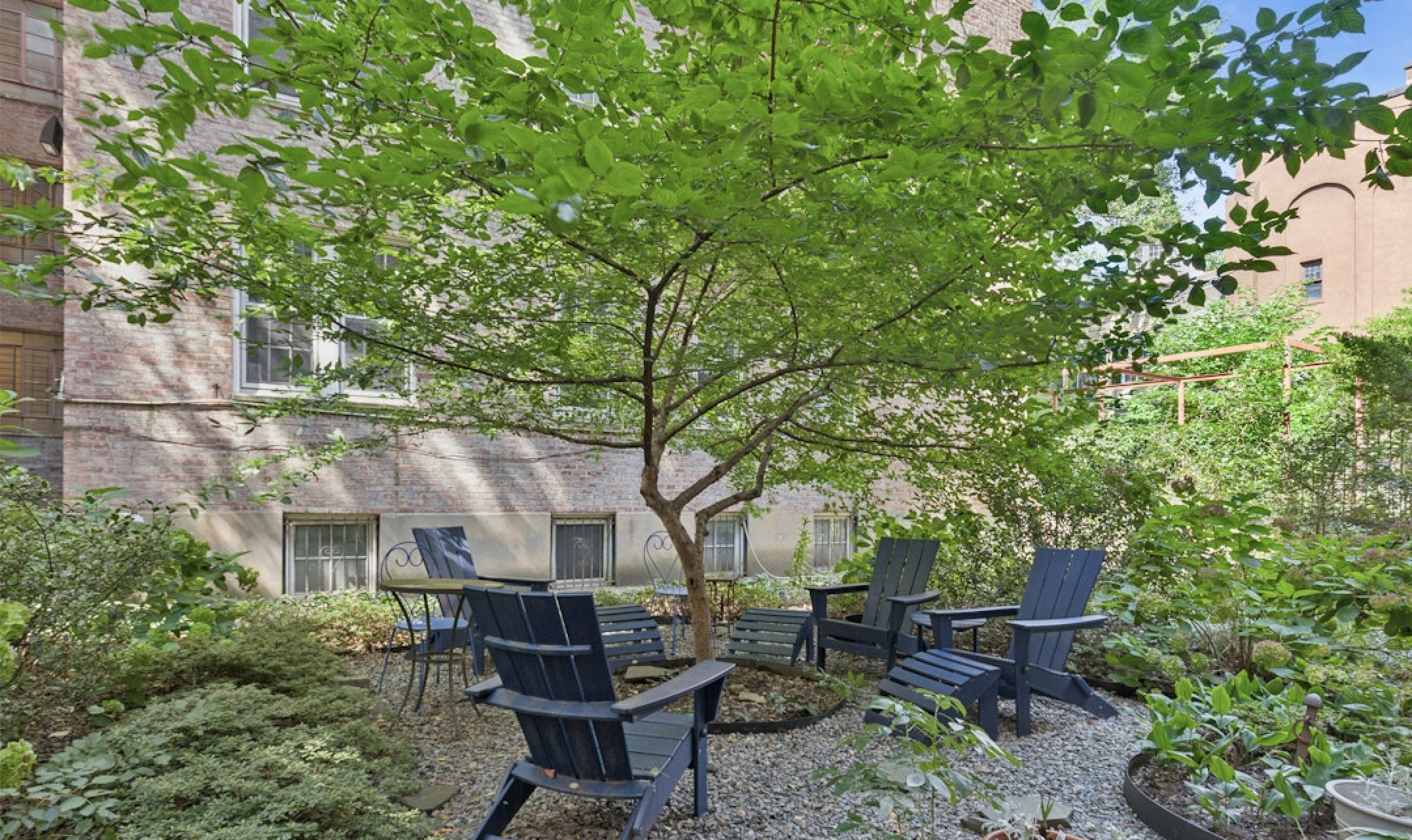 360 Clinton Avenue, Unit 6J Brooklyn, NY 11238 - Photo 8 of 10 a view of a chairs and table in a backyard