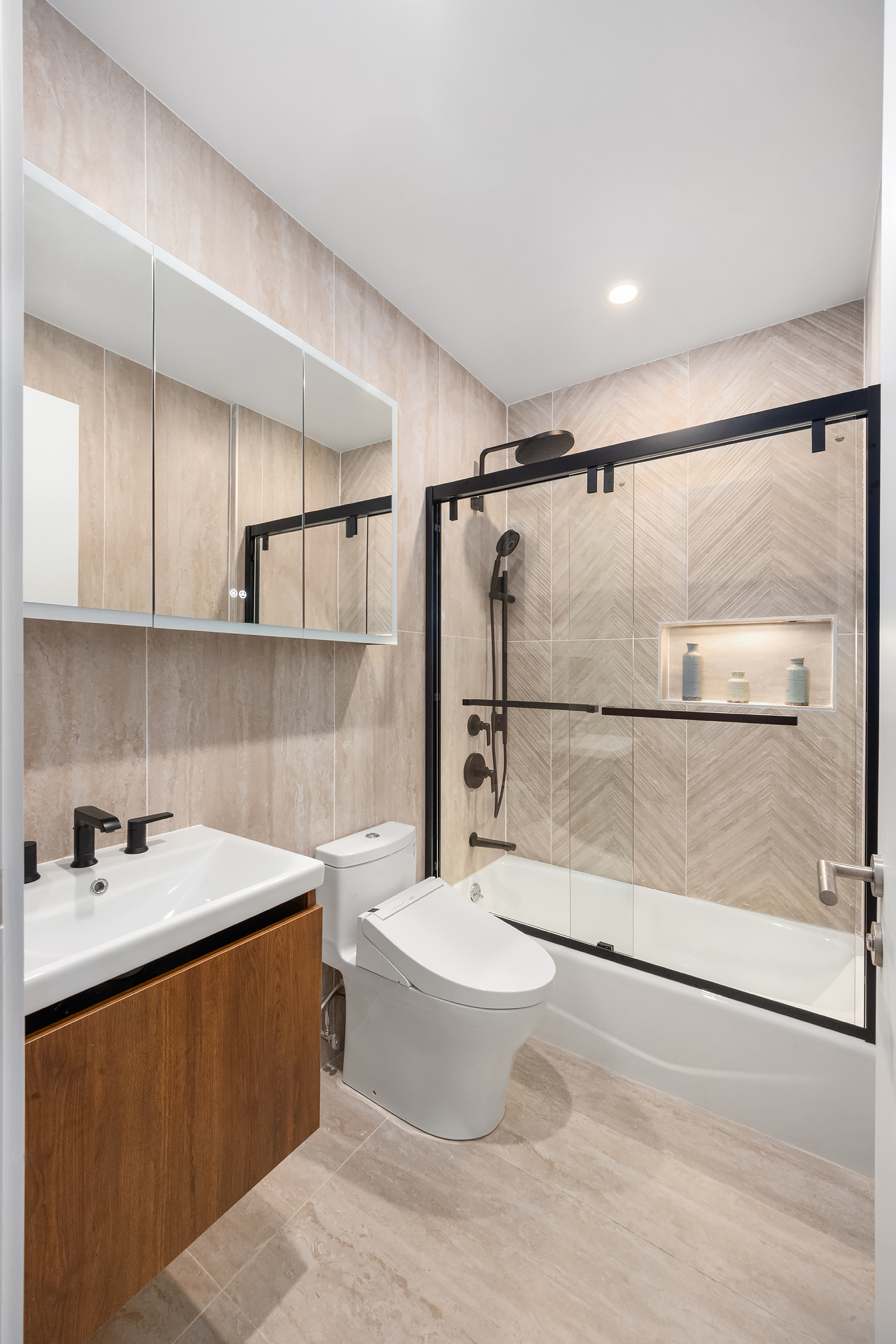 90 Herbert Street, Unit 4A Brooklyn, NY 11222 - Photo 5 of 10 a bathroom with a sink toilet and shower