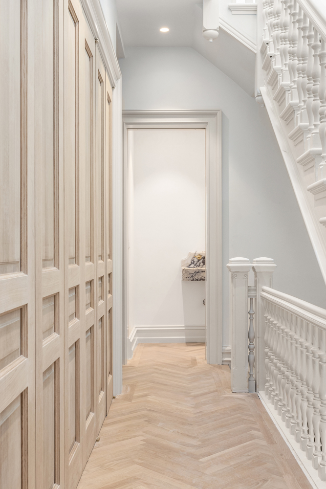 33 West 74th Street, Unit 2 Manhattan, NY 10023 - Photo 10 of 15 a view of a hallway with wooden floor and staircase