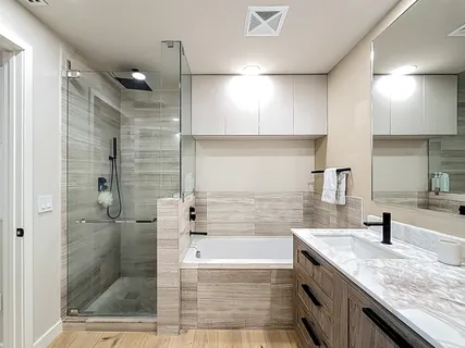 a balcony with hardwood filled with table and chairs
